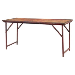 Table pliante en ferronnerie peinte des années 1920