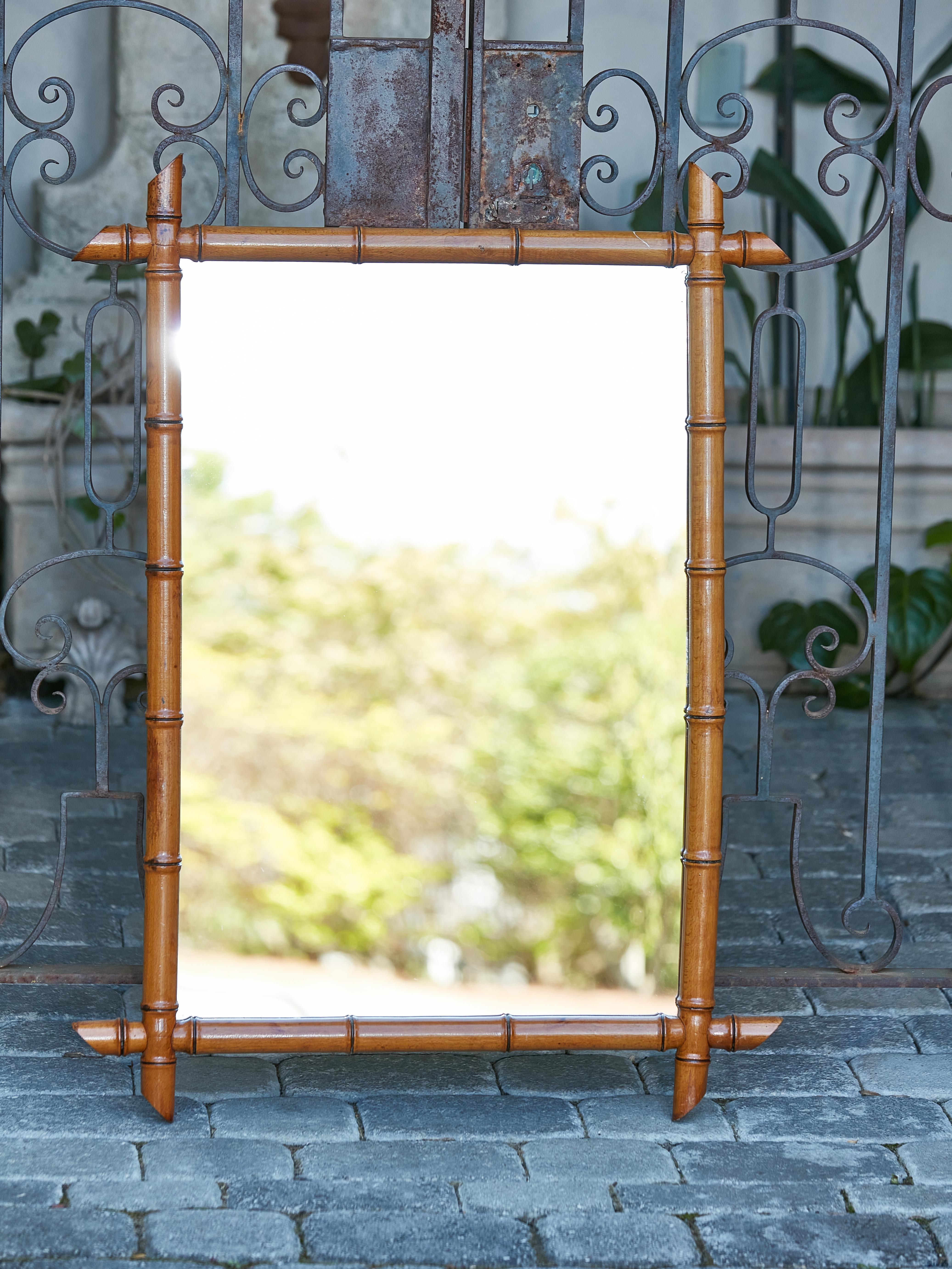 Carved French 1920s Rectangular Faux Bamboo Walnut Mirror with Brown Patina For Sale