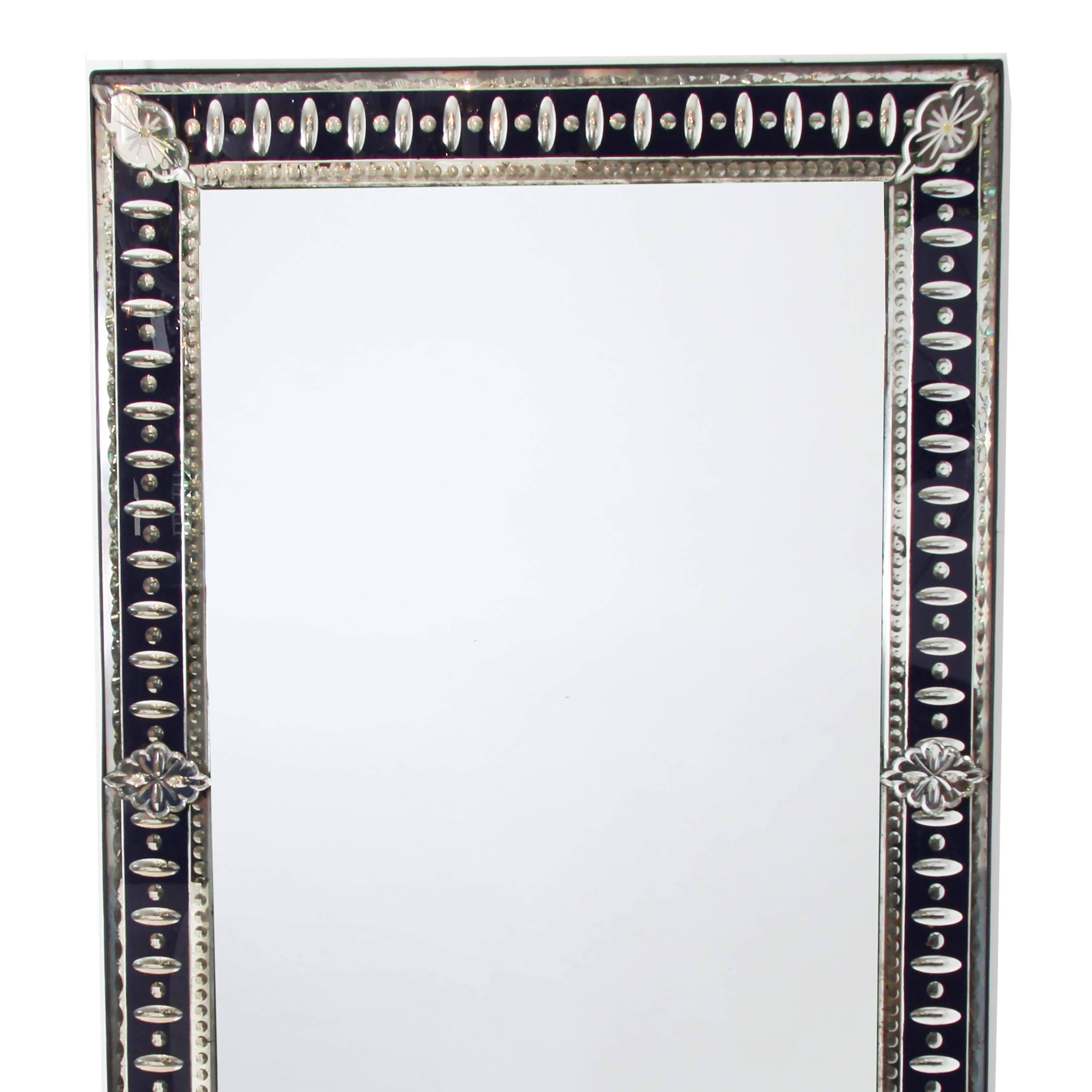 French 'Venetian' mirror made in the 1920s, this lovely piece has the original glass and the frame is an unusual midnight blue.