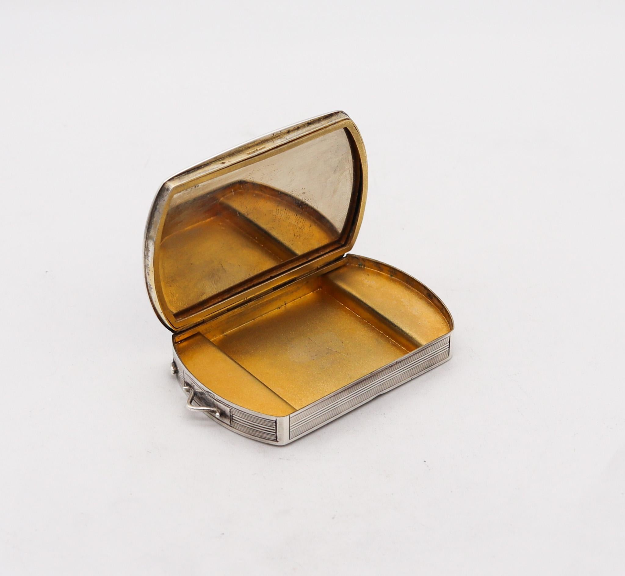 A French guilloche enameled pill box.

Beautiful French enamelled mechanical compact, created Paris during the art deco period, circa 1925. This beautiful box was carefully crafted with impeccable details in solid .925/.999 standard silver. The