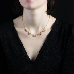 French 1925s 18 Karat Yellow White Gold Art Deco Pattern Drapery Necklace