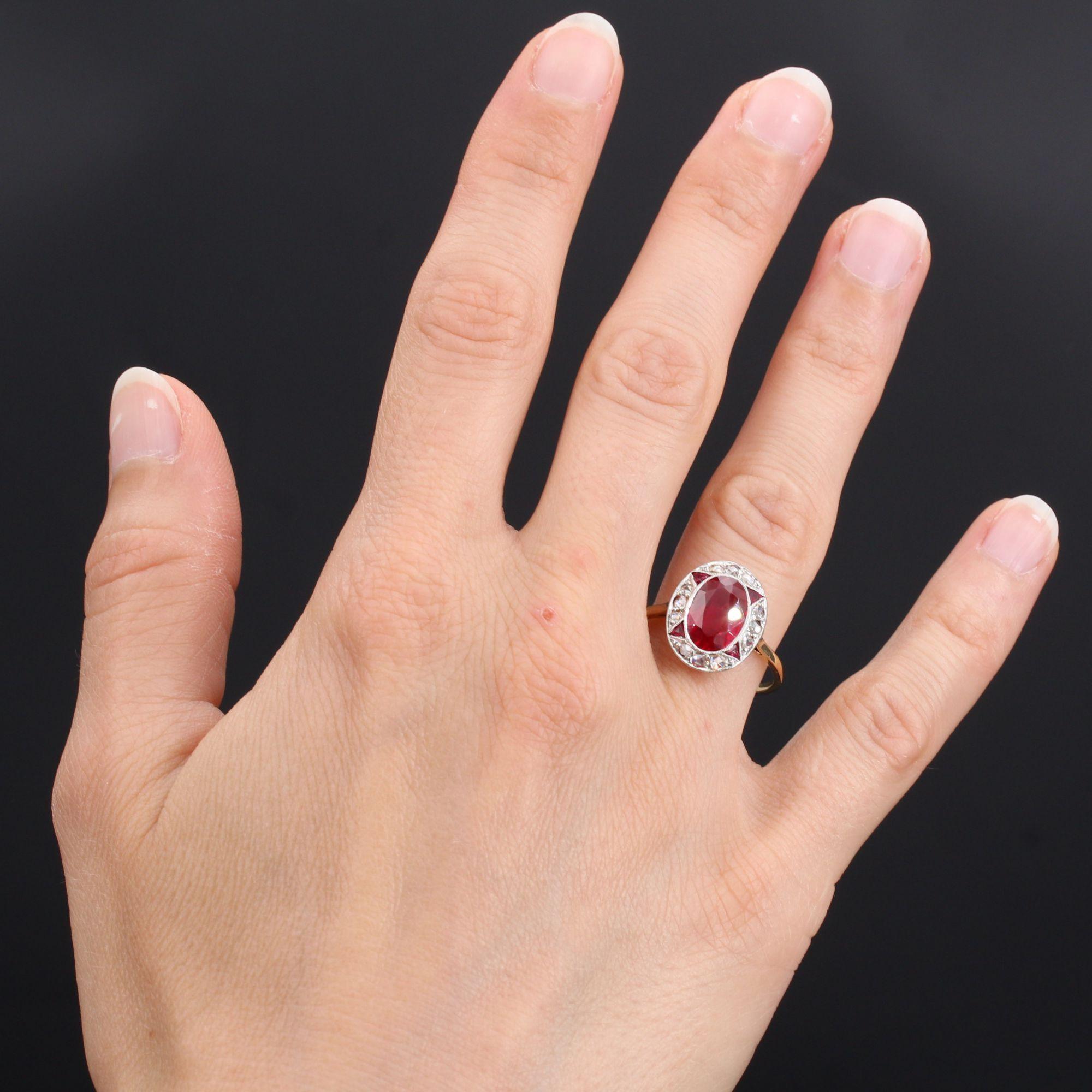 Ring in 18 karat yellow gold, eagle head hallmark and platinum.
Antique ring of charm, it is formed of a setting of flat oval form, millegrain closed set in the center of a verneuil ruby, surrounded by rose- cut diamonds and triangular verneuil