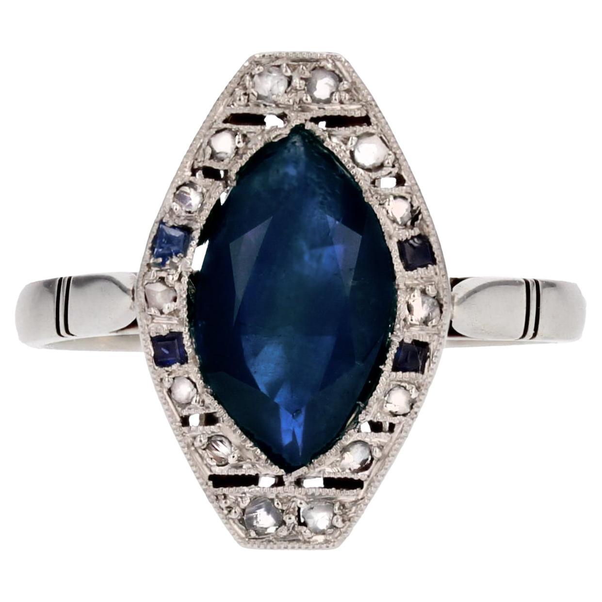 French 1925s Art Deco Sapphire Diamonds 18 Karat White Gold Shuttle Ring For Sale