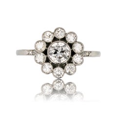 Anello francese del 1925 con diamante e margherita in platino