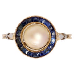 French 1925s Mabe Pearl Calibrated Blue Gems 18 Karat Yellow Gold Ring