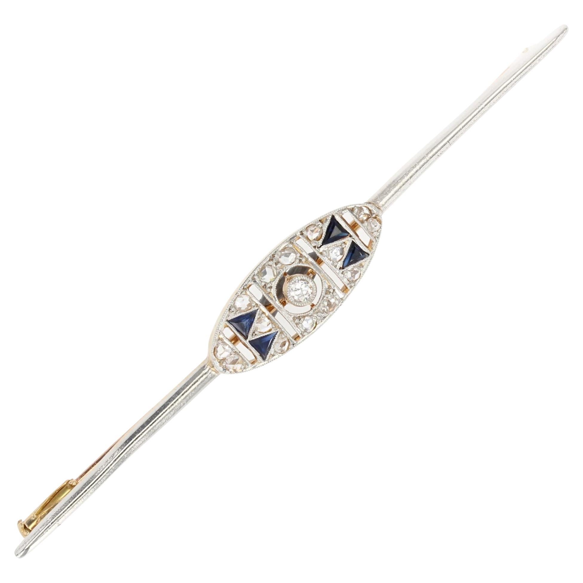 Broche barrette en or jaune et blanc 18 carats, saphir et diamants, datant des années 1925.