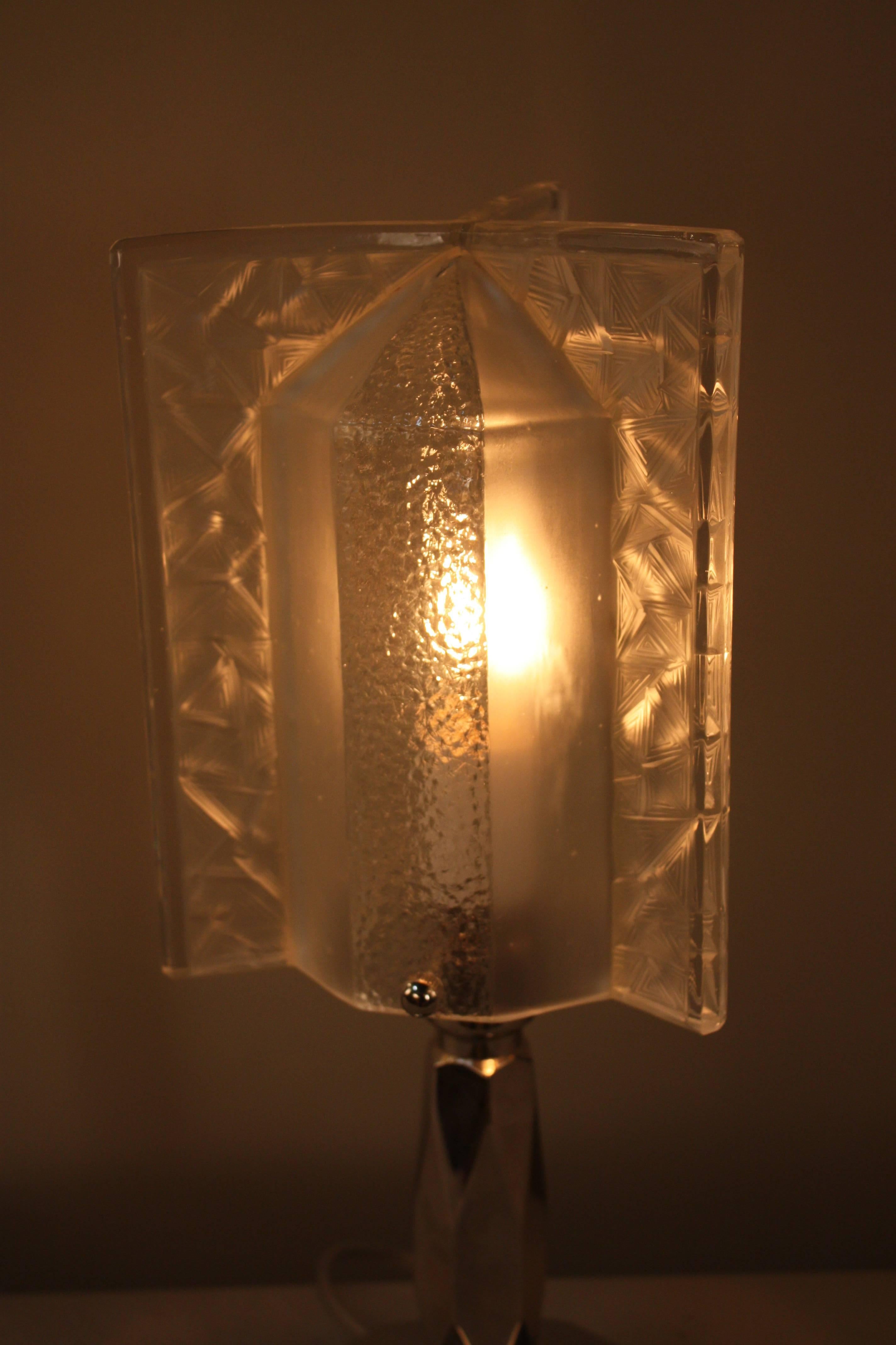 Clear frost glass shade in shape rocket with nickel on bronze base table lamp.