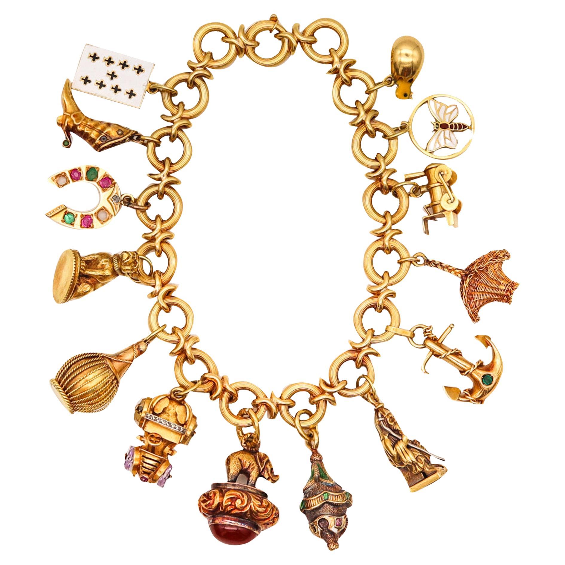 French 1930 Art Deco Twisted Links Bracelet with 14 Charms in Solid 18kt Gold For Sale