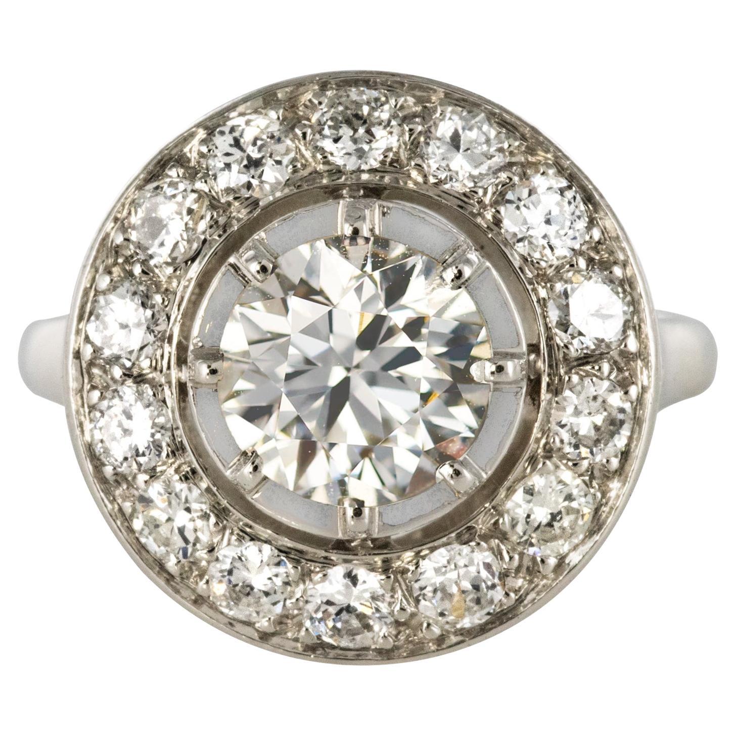 French 1930s Art Deco 1.62 Carat Diamonds Round Platinum Engagement Ring For Sale