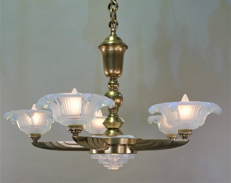 French 1930s light honey blue glass shades bronze frame chandelier by Ezan and Petitot.
Measures: Total height including all the chain 41