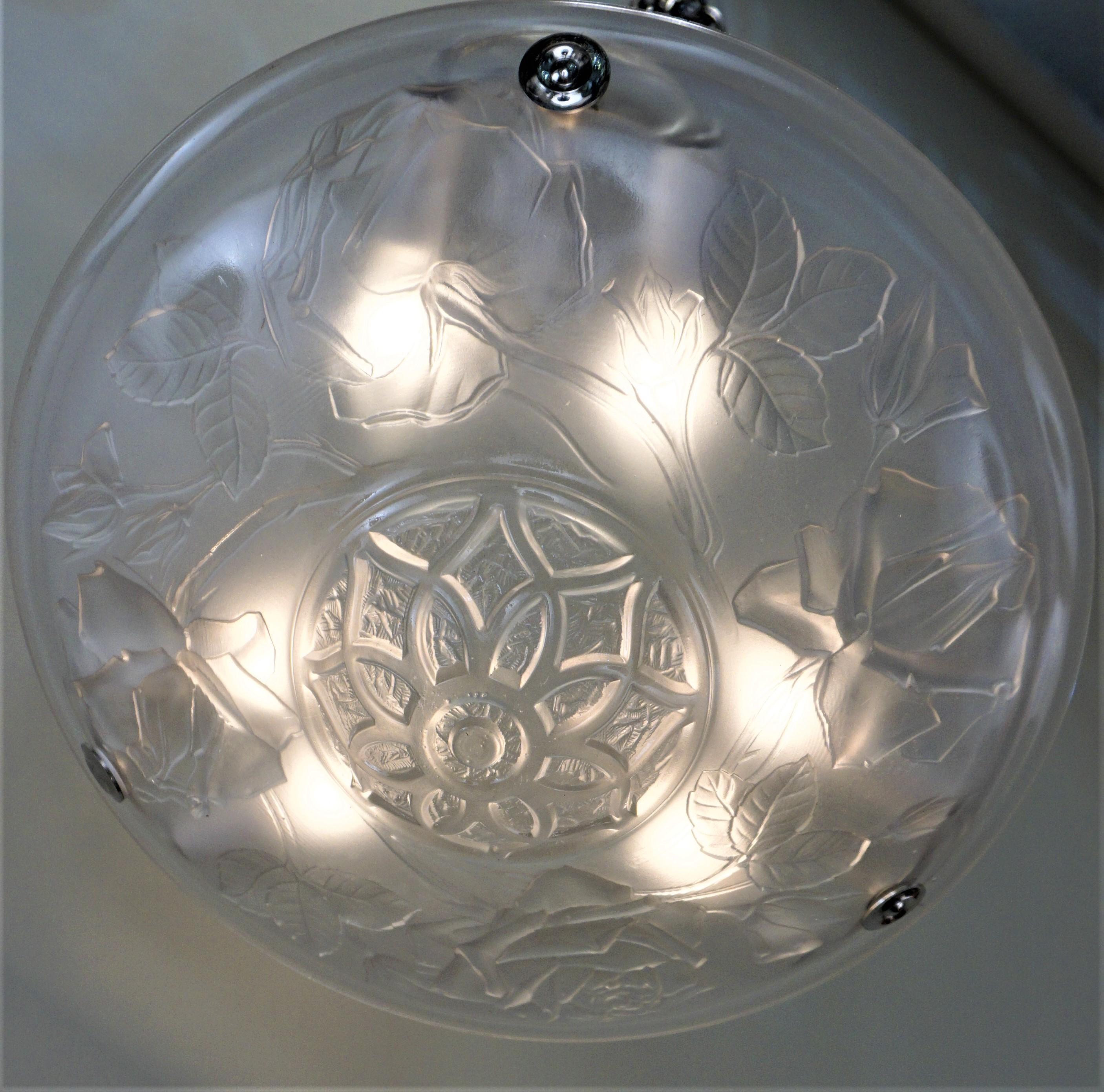 Clear frost glass with nickel on bronze hardware French Art Deco chandelier.
Total of 6 lights 60 watt max each.