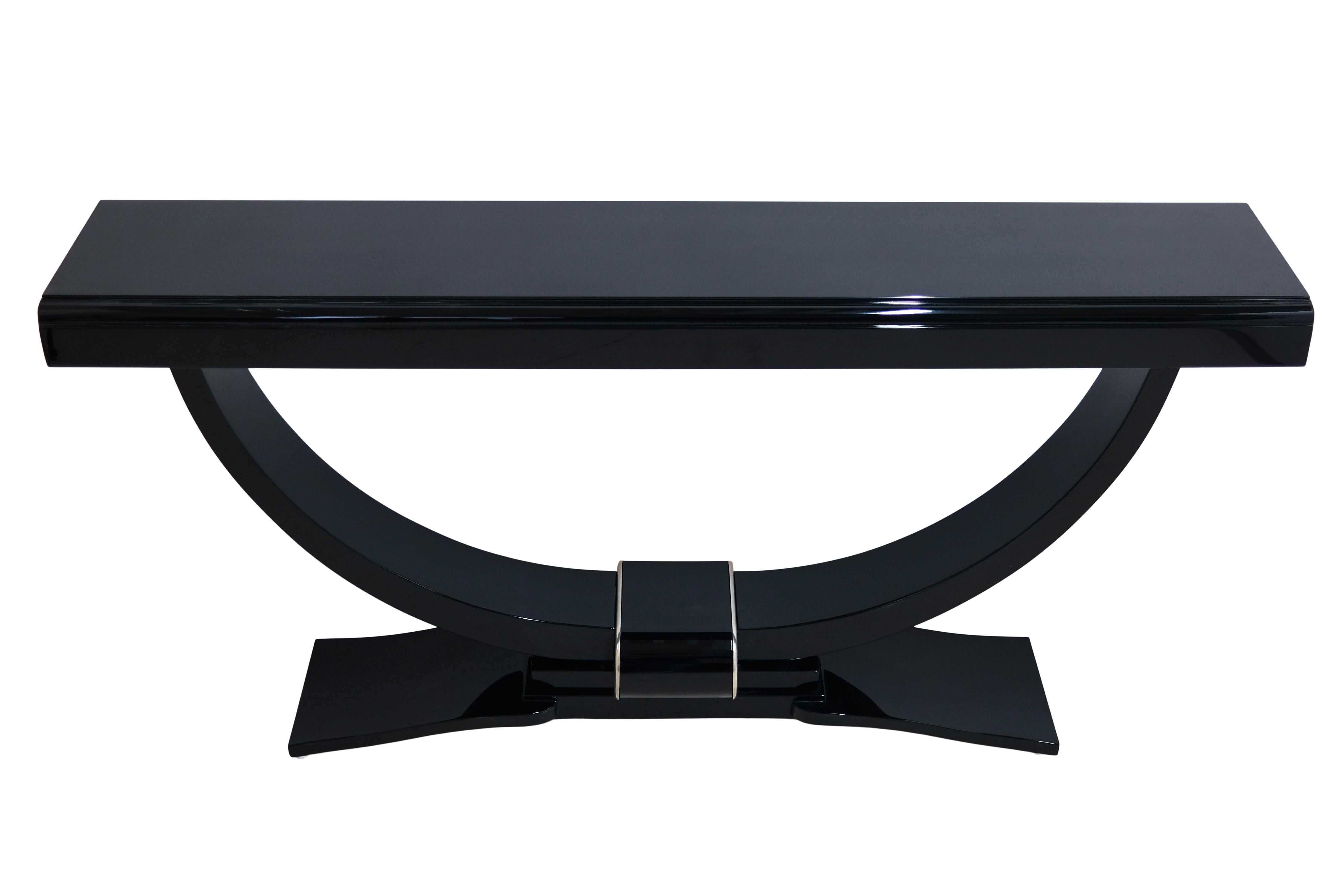 Console table
Piano lacquer in black high gloss
Original metal applications, chrome/nickel plated
Can be protected with a glass top black in itself for daily use.

Original Art Deco, France 1930s

Dimensions:
Width: 160 cm
Height: 79