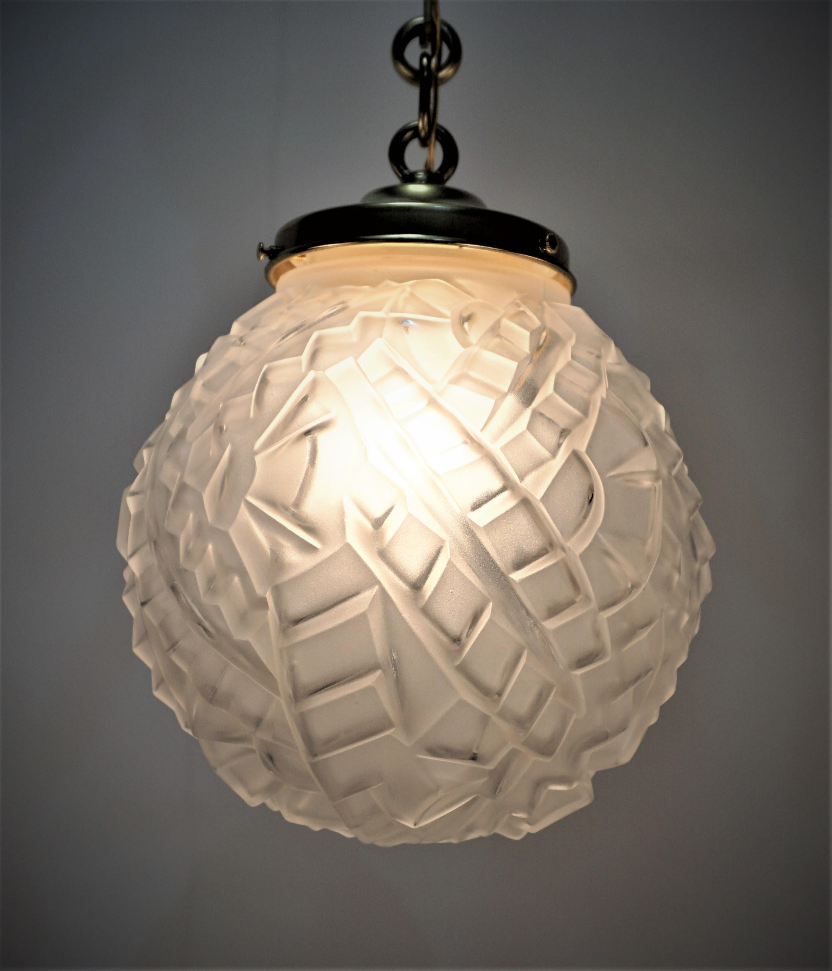 French 1930's clear frost glass globe pendant chandelier with bronze hardware.