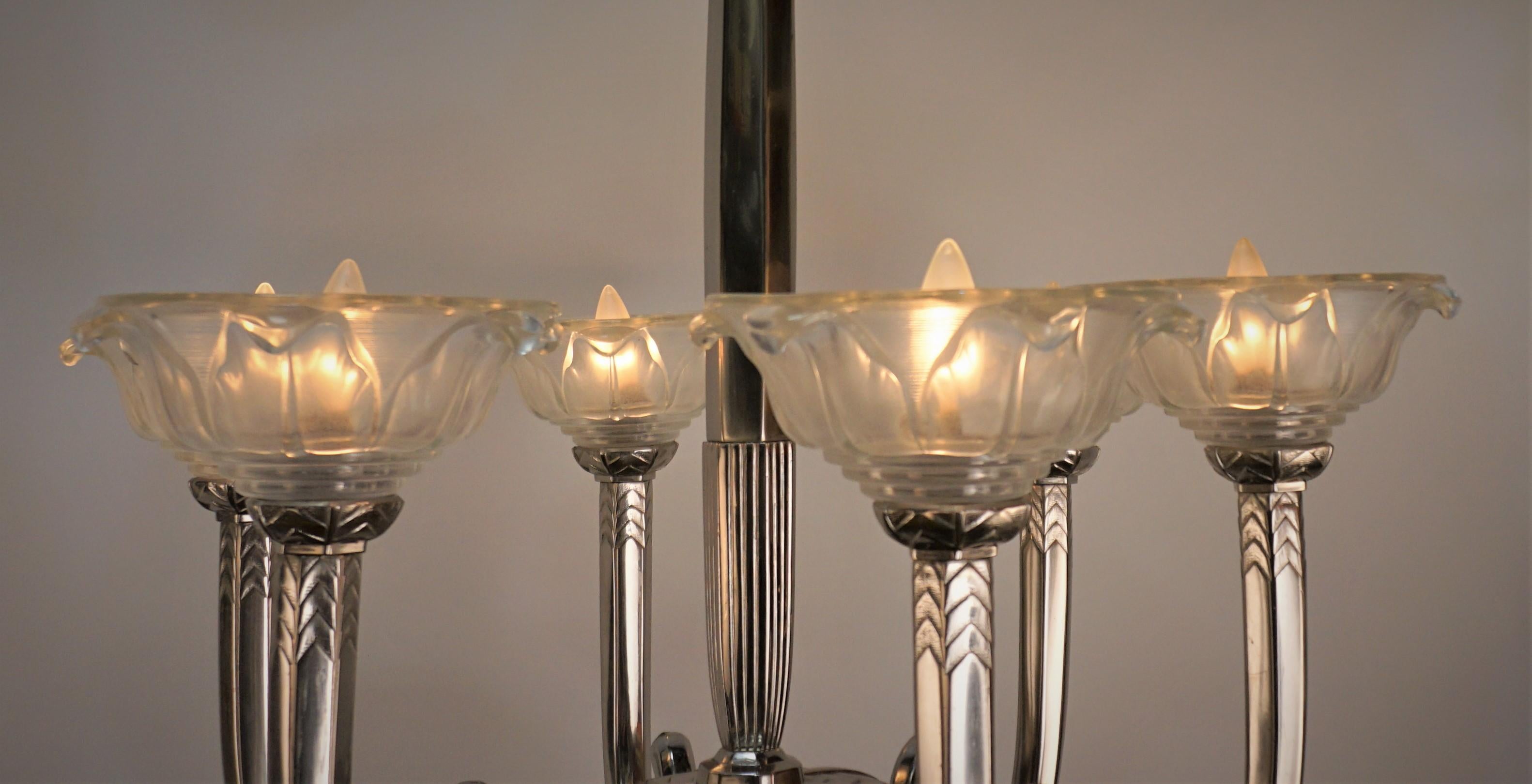 Elegant six arm nickel on bronze with clear frost glass shades art deco chandelier.