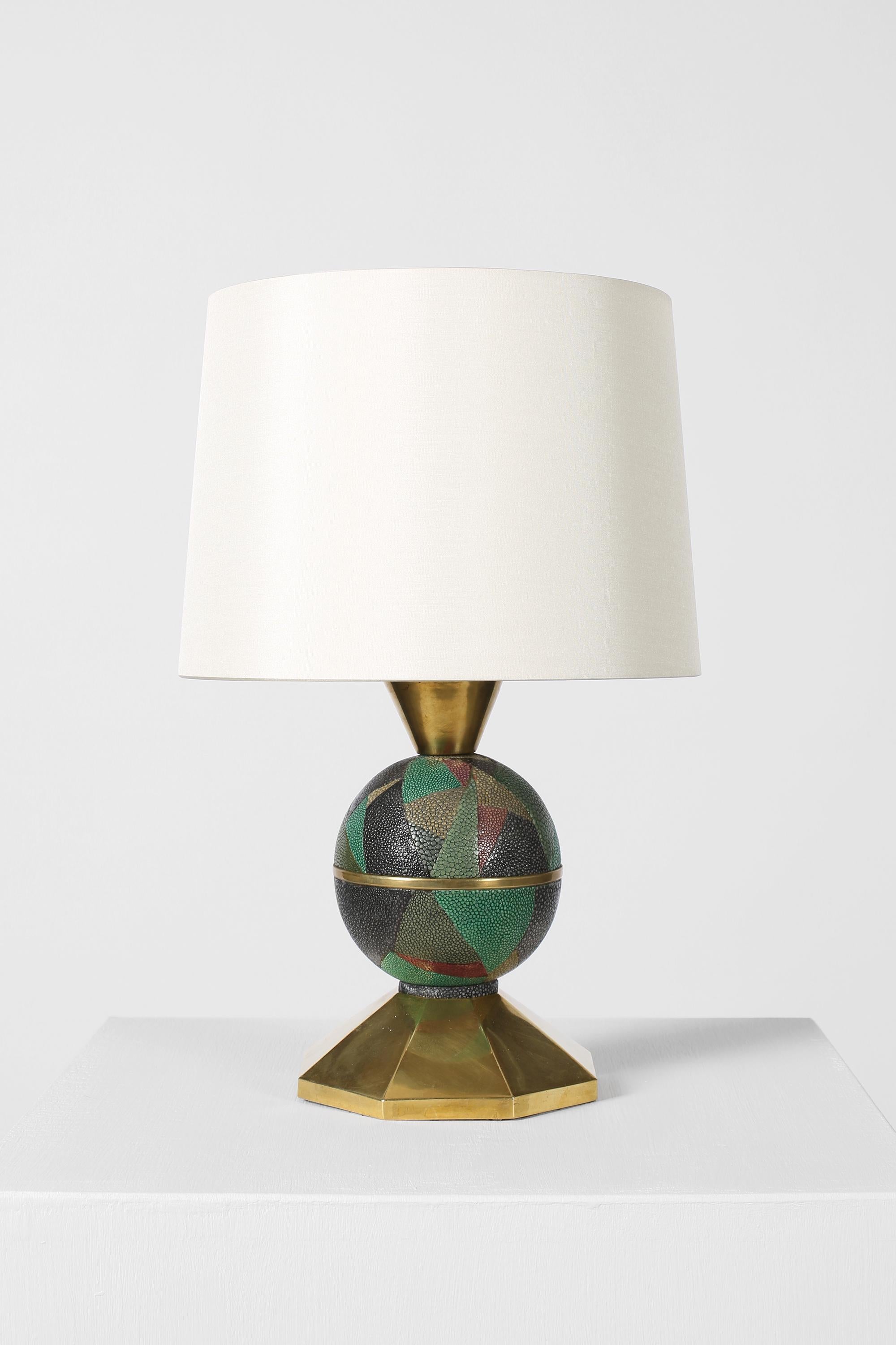 A rare gilt bronze and galuchat clad table lamp attributed to André Groult (1884-1966). Stamped A.G with hallmark to the base. French, c. 1930s. Supplied with an off white dupion silk shade.