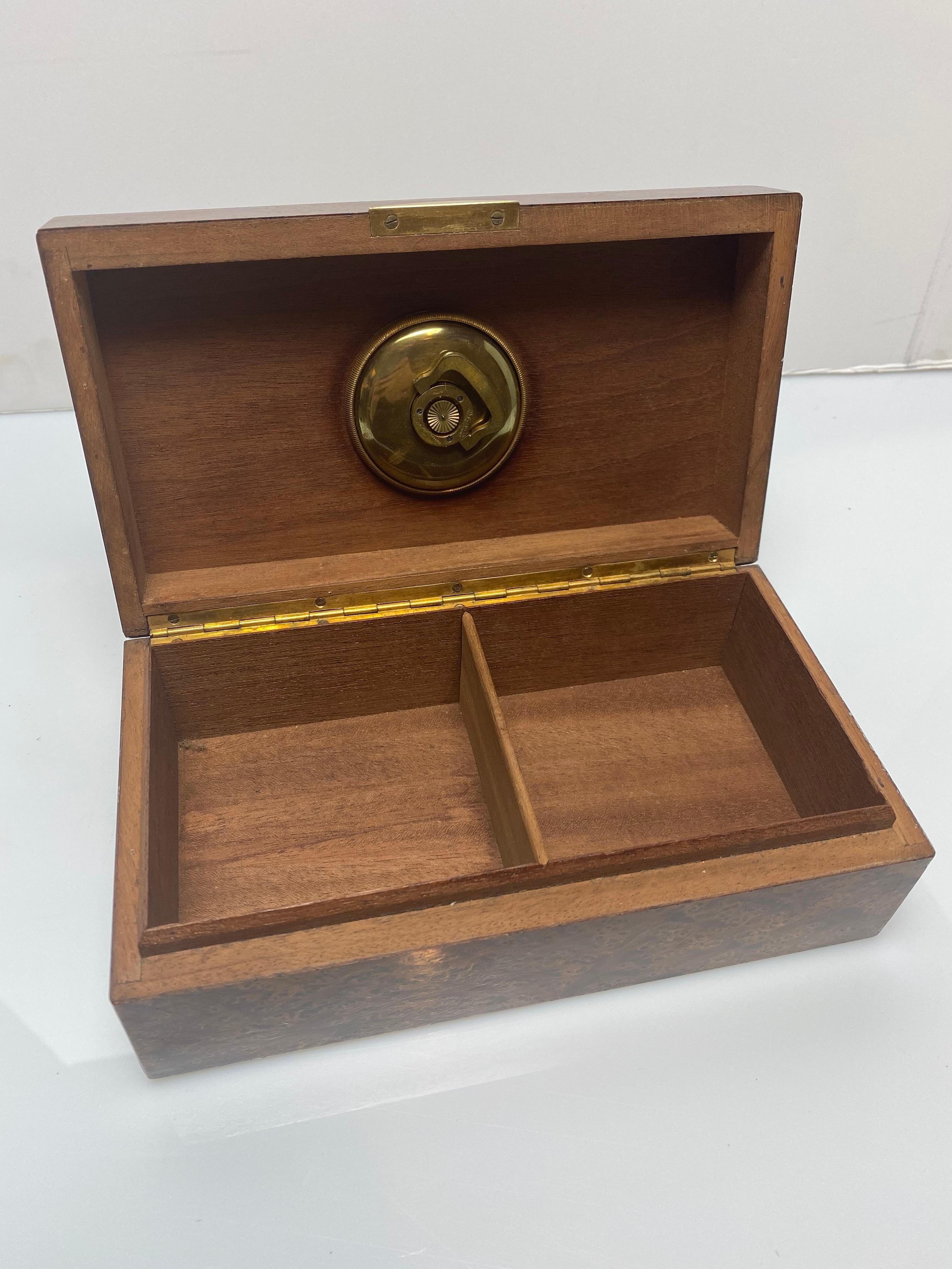 A rare and elegant box with an inset clock. French 1930s, 8 Day movement.