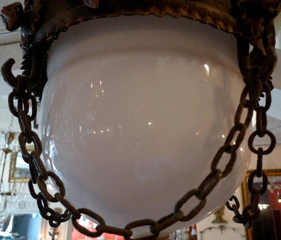 20th Century French 1930s Cast Iron Pendant with Milk Glass Globe and Chain Surround For Sale