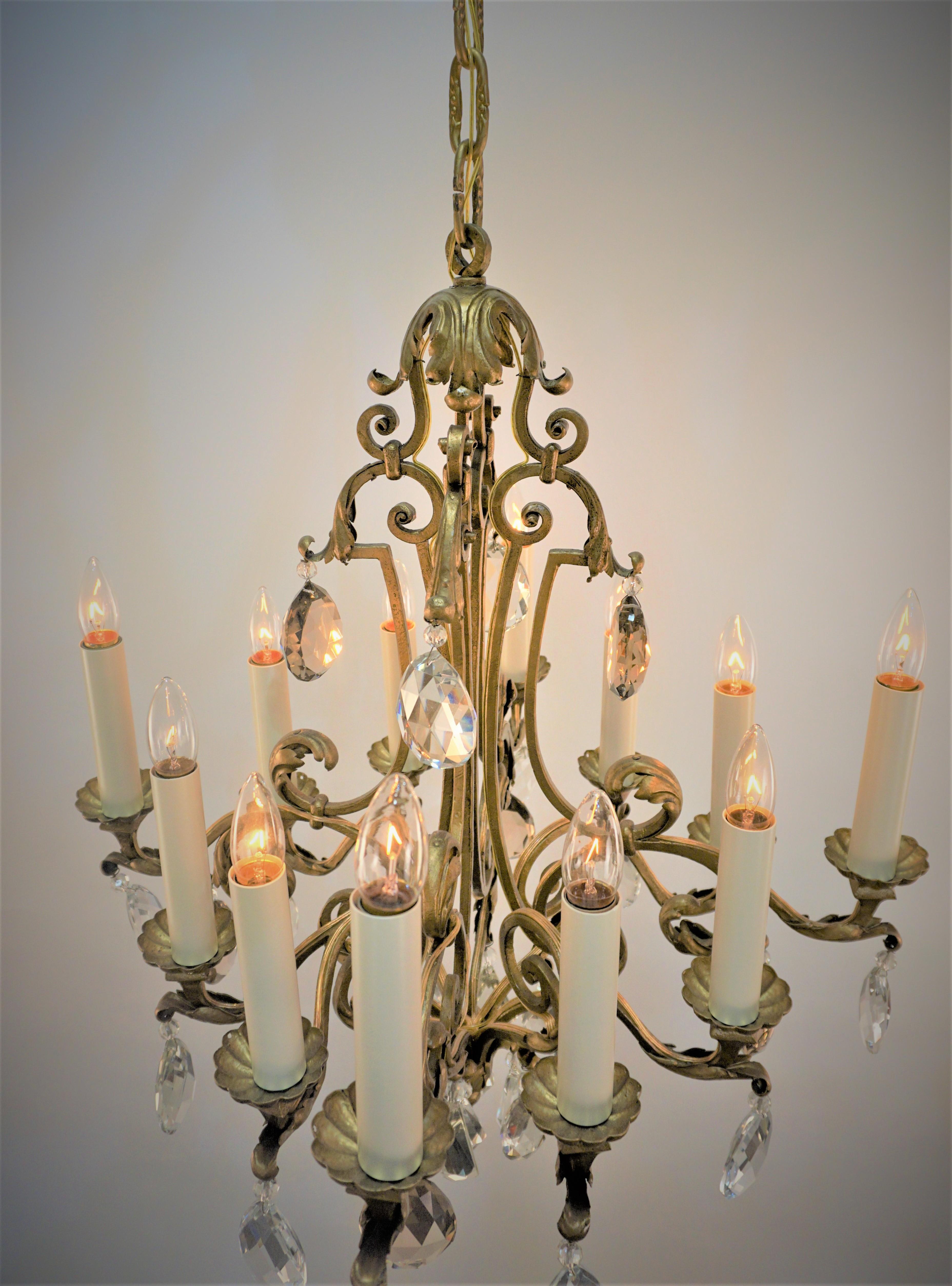 French 1930's gilt Iron and Crystal chandelier For Sale 5