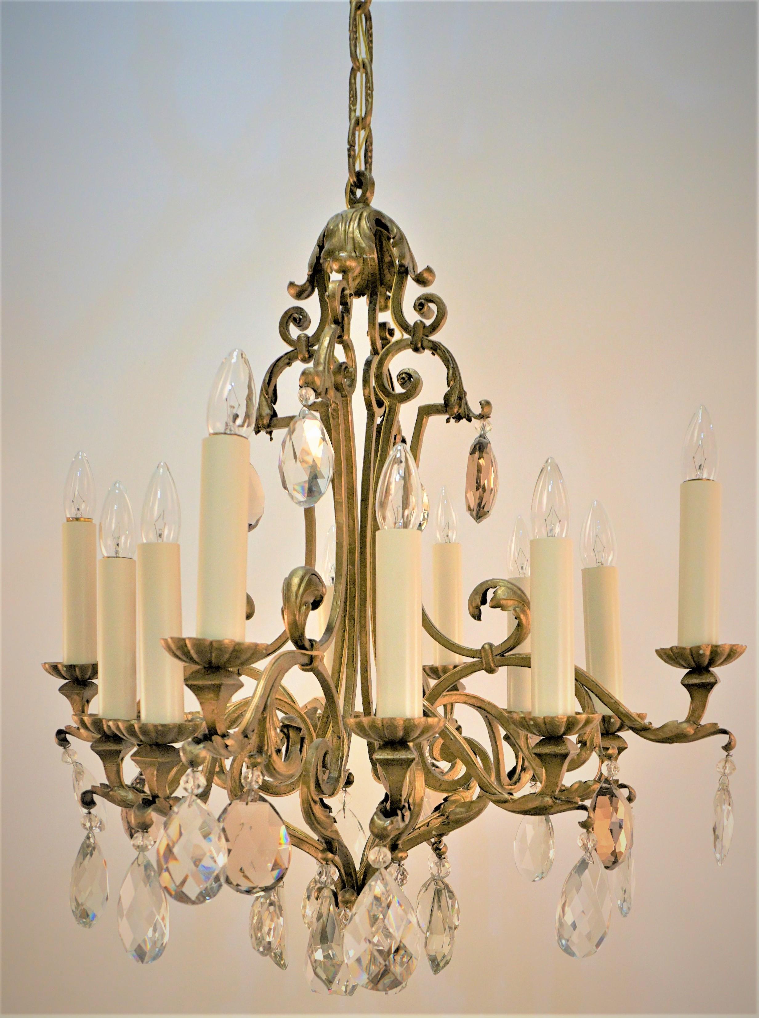 French 1930's gilt Iron and Crystal chandelier For Sale 6