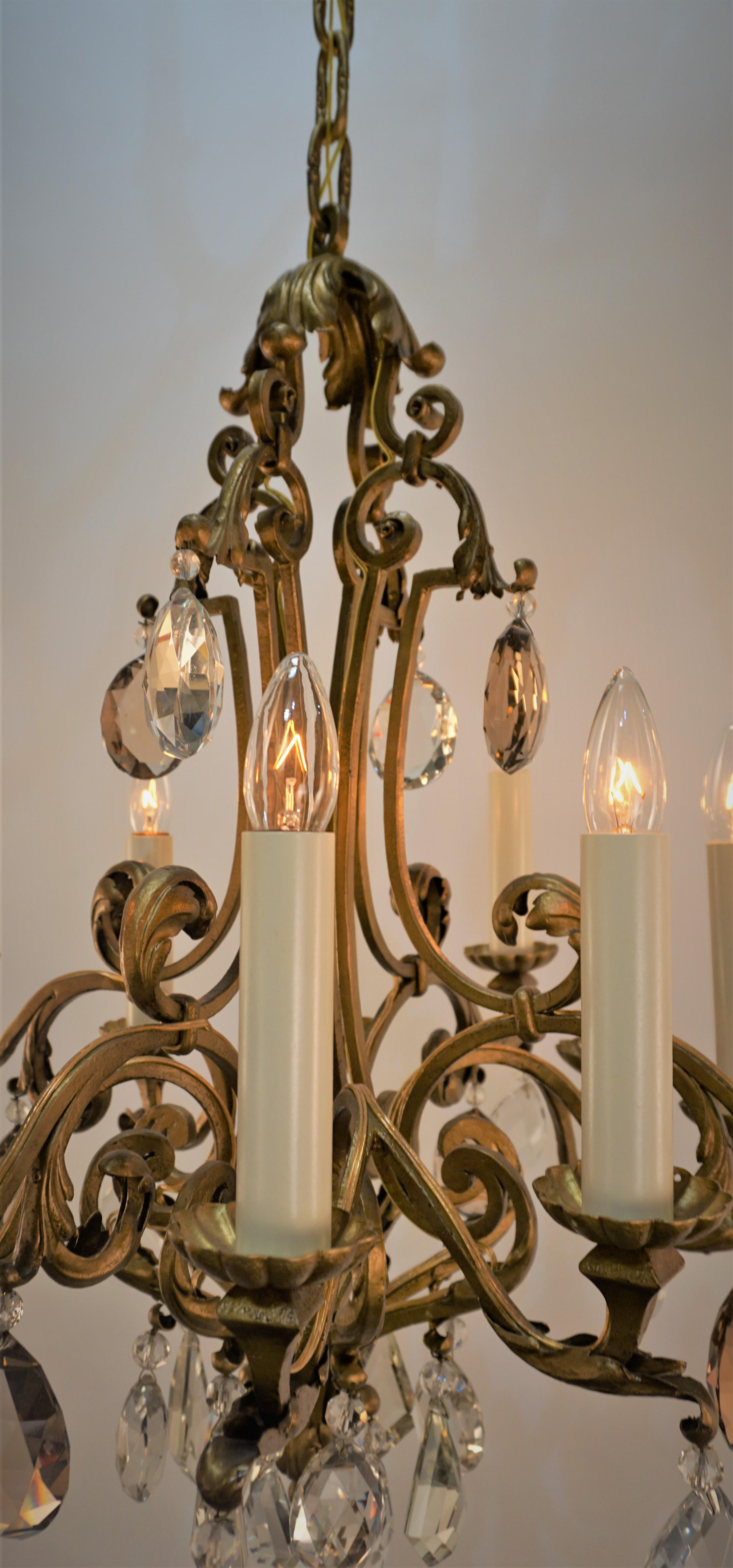 French 1930's gilt Iron and Crystal chandelier In Good Condition For Sale In Fairfax, VA