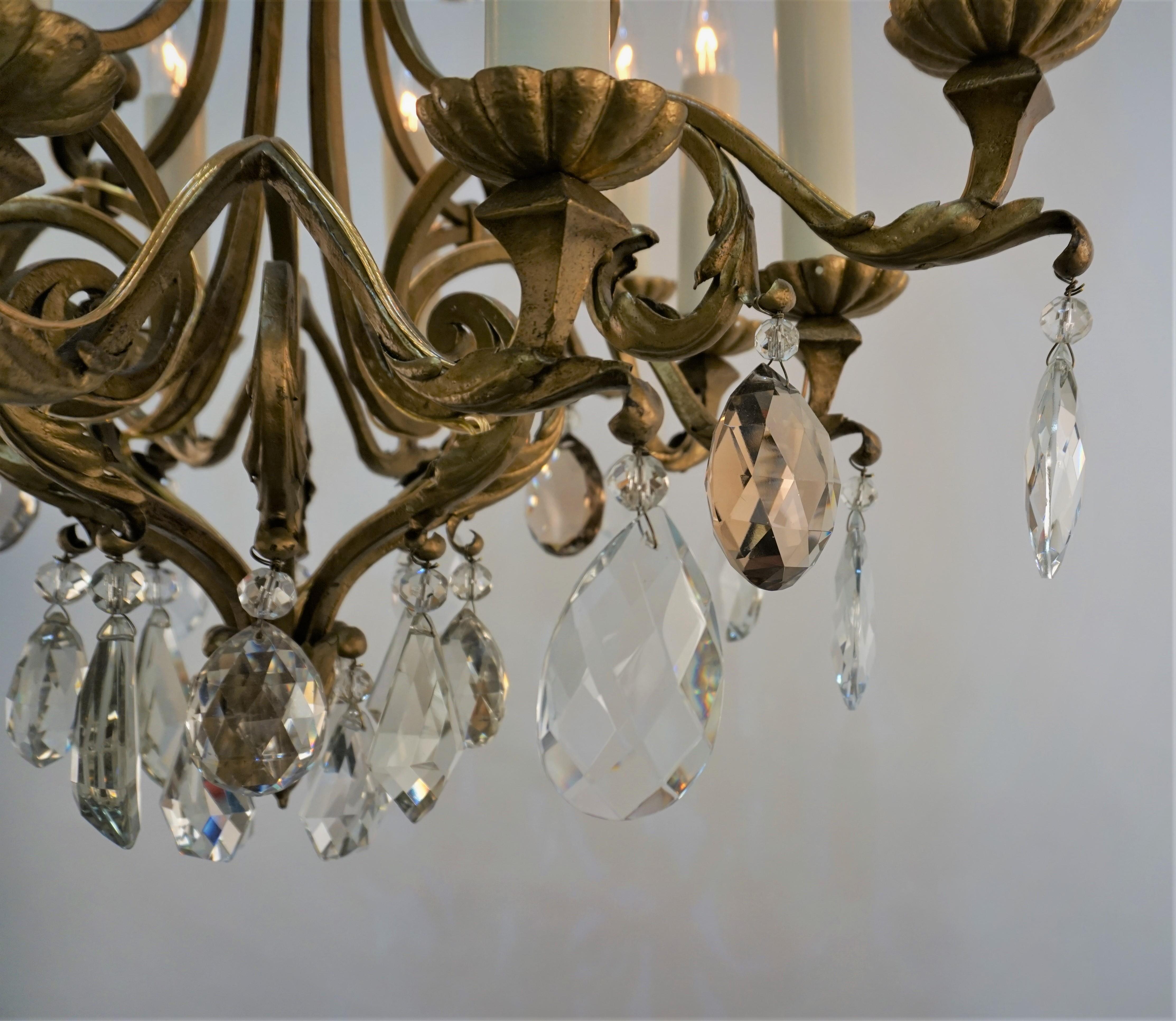 Mid-20th Century French 1930's gilt Iron and Crystal chandelier For Sale