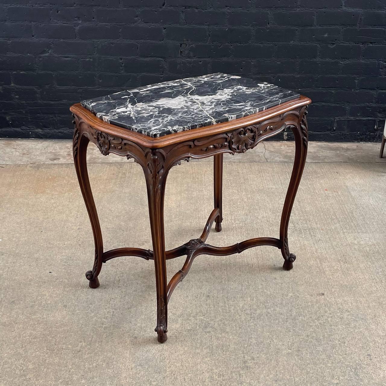 French 1930s Louis XV Style Table with Carved Rocaille Decorations 

Country: French
Materials: Carved Wood, Marble Top
Condition: Original Condition
Style: French Antique
Year: 1930’s

$2,200

Dimensions 
31”H x 32.50”W x 22.75”D