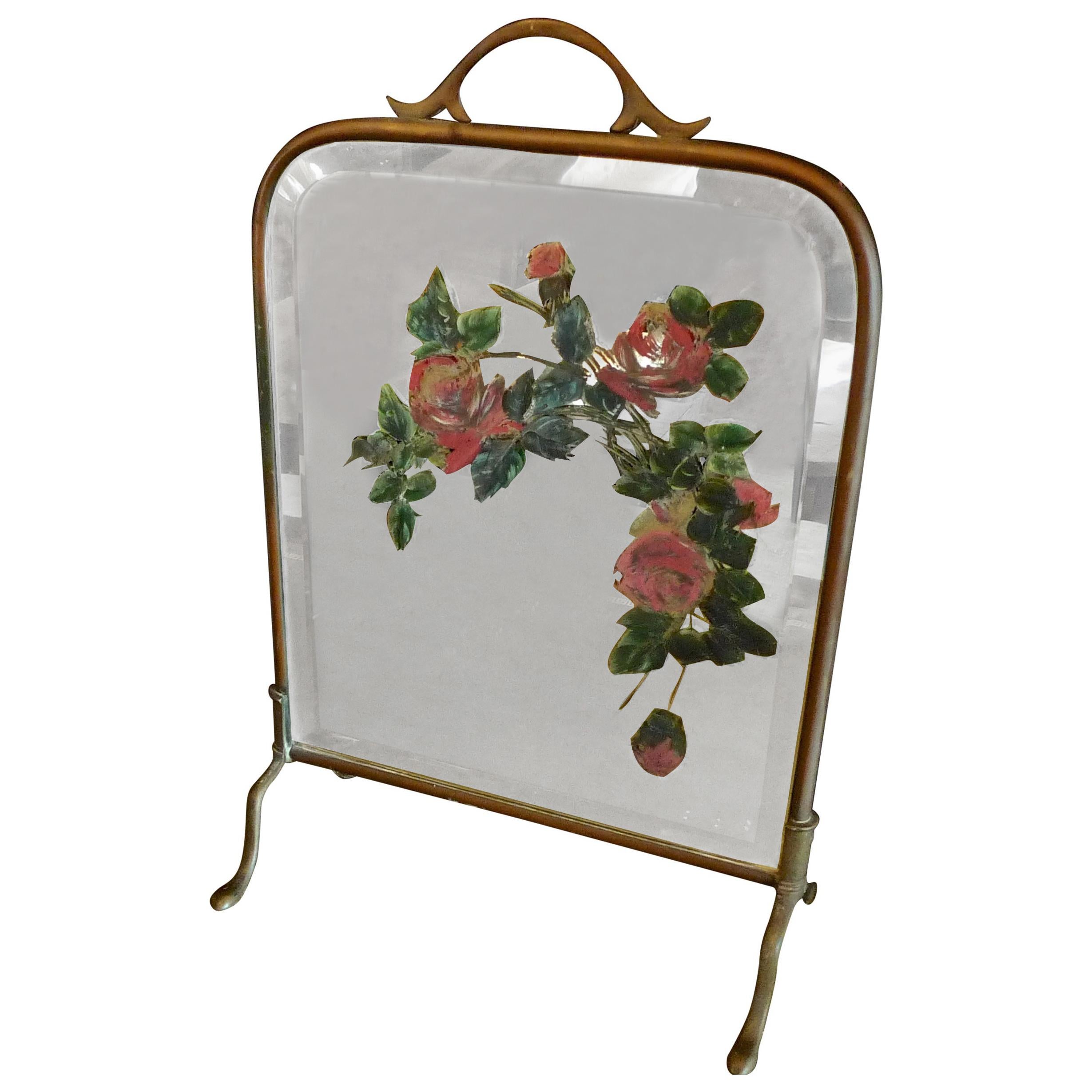 French 1930s mirrored fire screen with handle and painted flowers on beveled mirror glass.