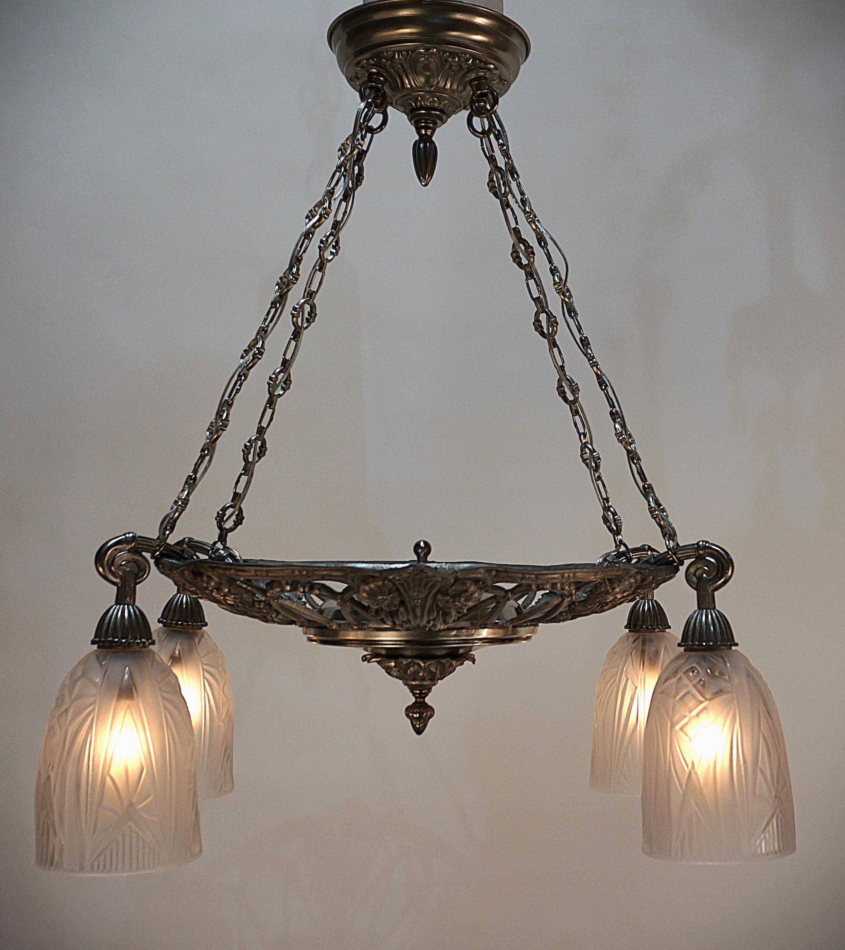Clear frost glass with satin nickel on bronze frame French 1930's four lights chandelier.
Professionally rewired and ready for installation.