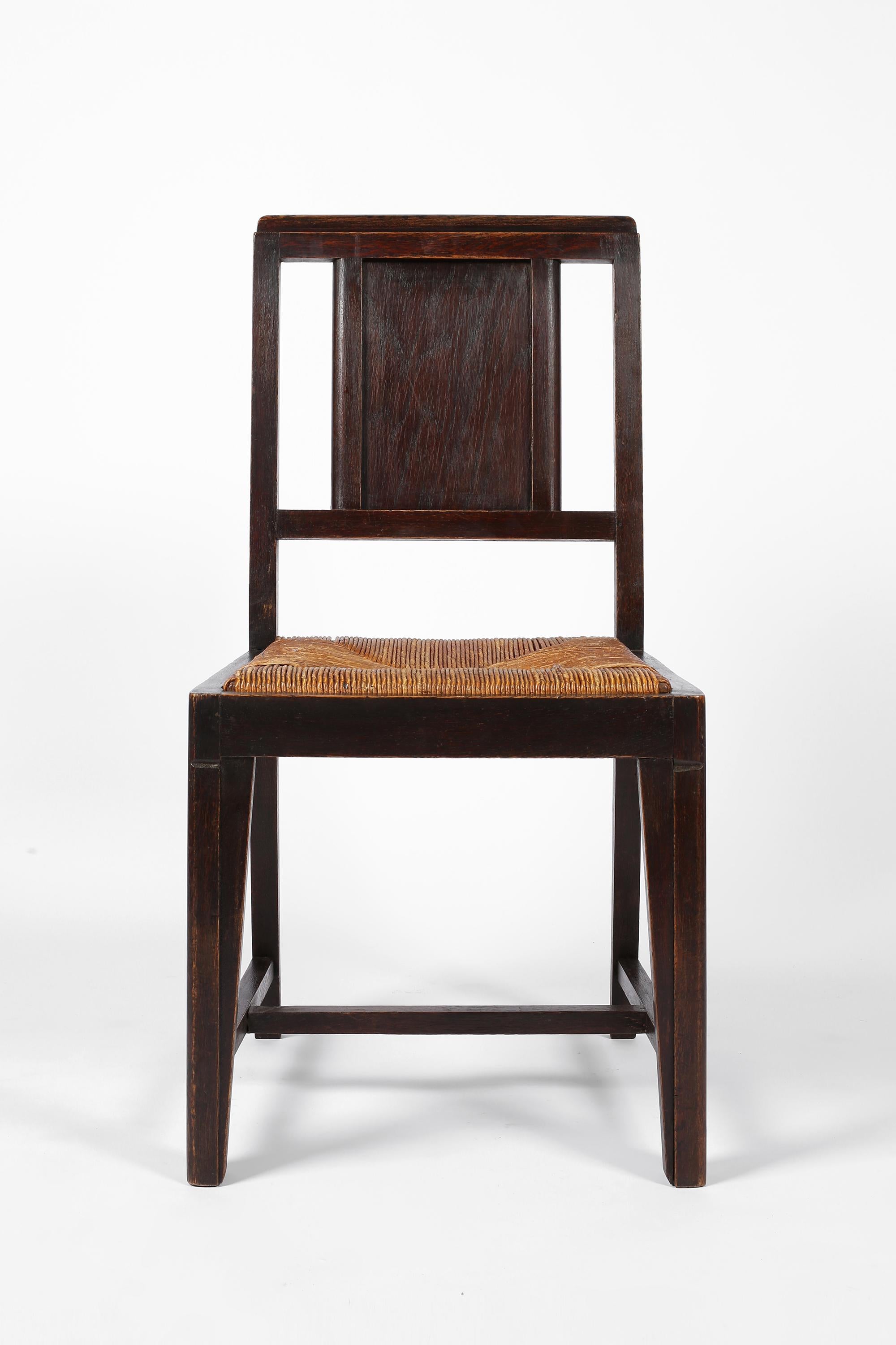 A rare set of six modernist stained oak dining chairs with original woven rush seats attributed to Francis Jourdain. 

French, c. 1930s.

Francis Jourdain (1876-1958) - Born in Paris and son of famous Belgian architect Frantz Jourdain. Primarily a