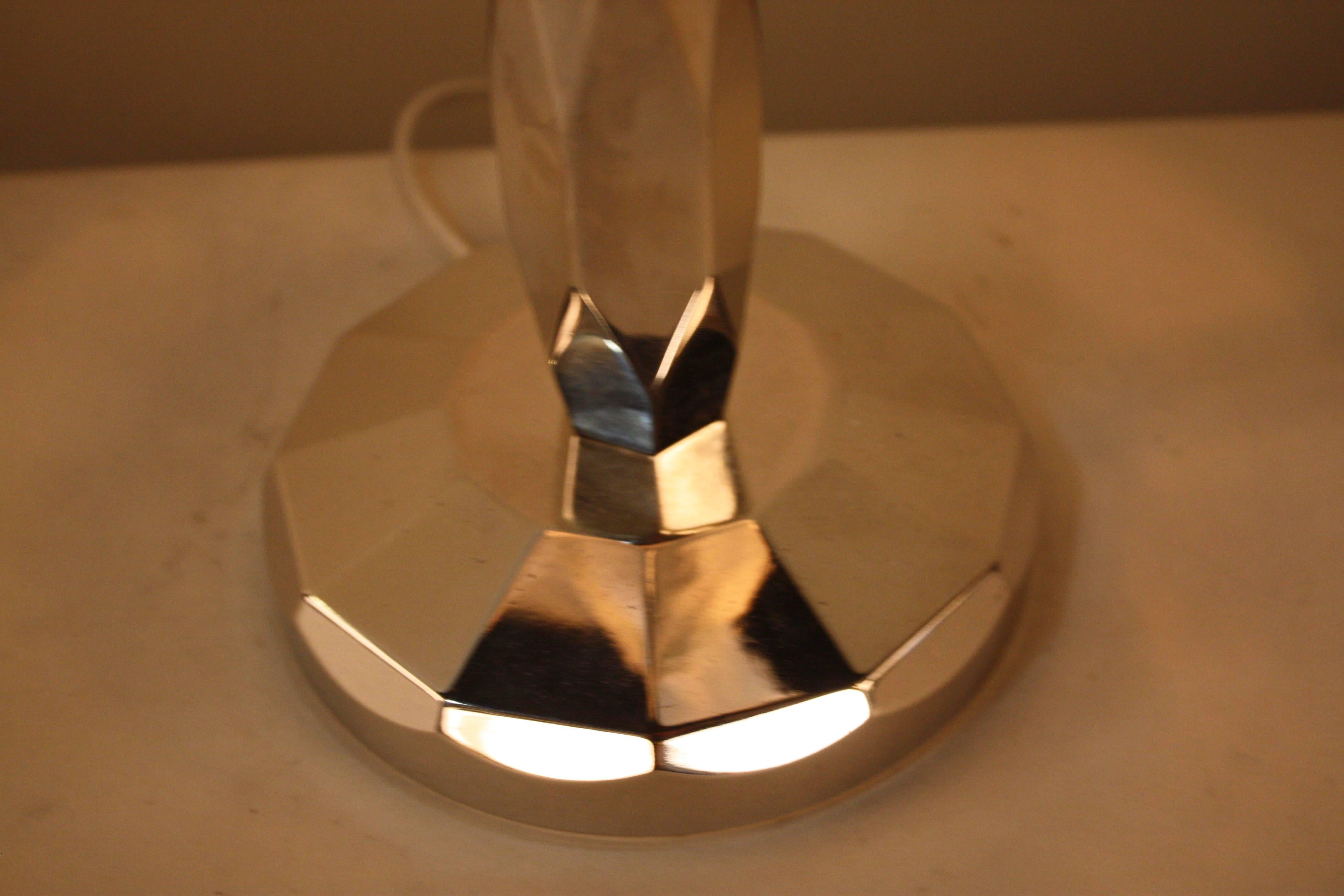 Clear frost glass shade in shape rocket with nickel on bronze base table lamp.