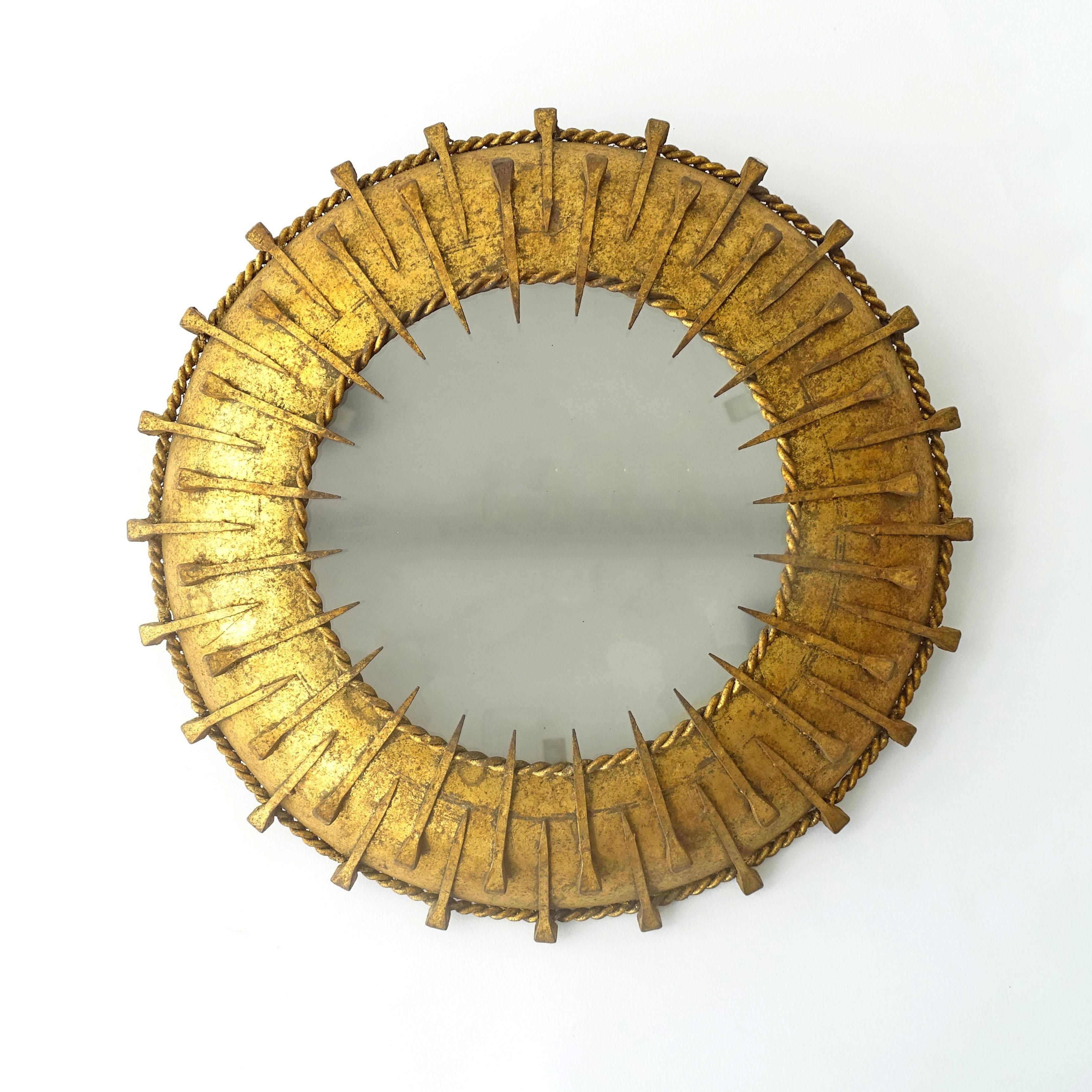 Metal French 1930s Surrealist Sunburst light fixture in gilt iron and nails For Sale
