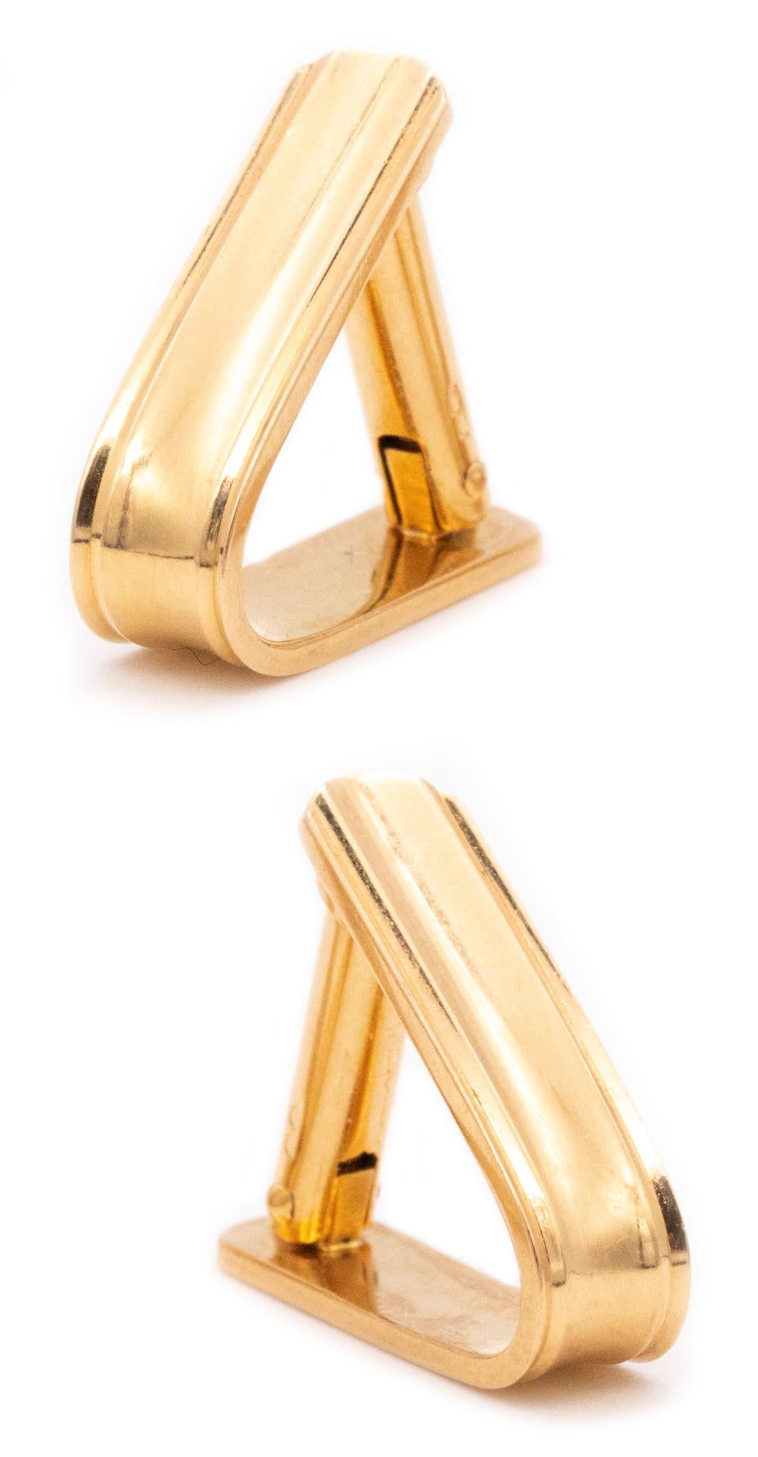 A pair of French stirrup Cufflinks.

Nice V shaped pieces from the French art deco period, probably created during the pre-war period or the beginning back in the 1940's. They are crafted in solid 18 karats of high polished yellow gold and suited