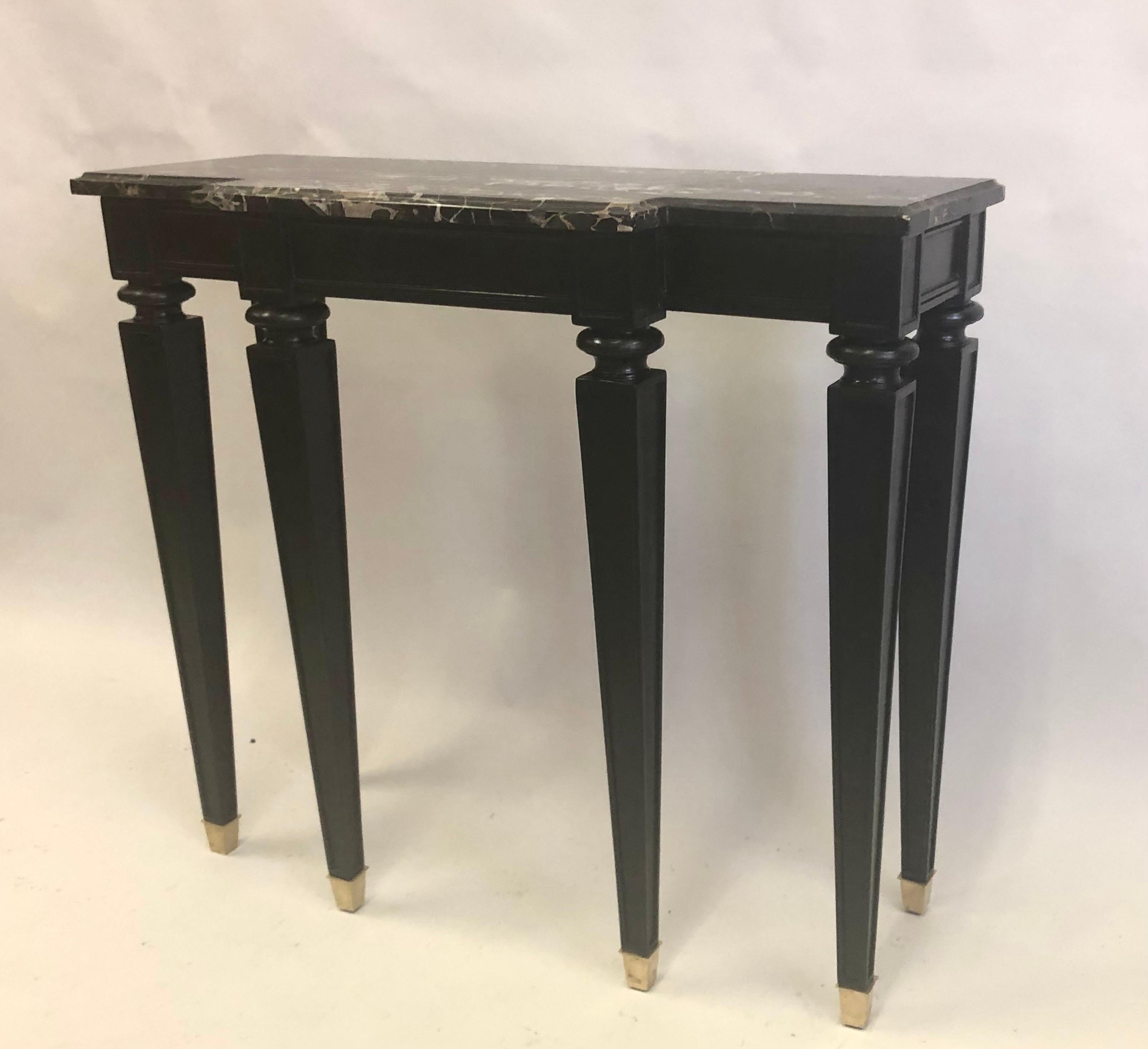 Rare, refined and timeless French Mid-Century Modern neoclassical console by Andre Arbus circa 1940. The piece features a dramatic mannerist architectural model as it is set upon 6 hand carved legs, each fluted with strong border lines and