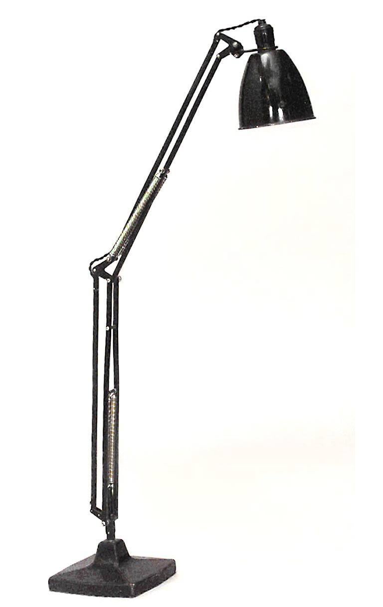 French 1940s black metal adjustable desk lamp with black leather square base and black metal shade (signed on base: HERMES, PARIS).
 