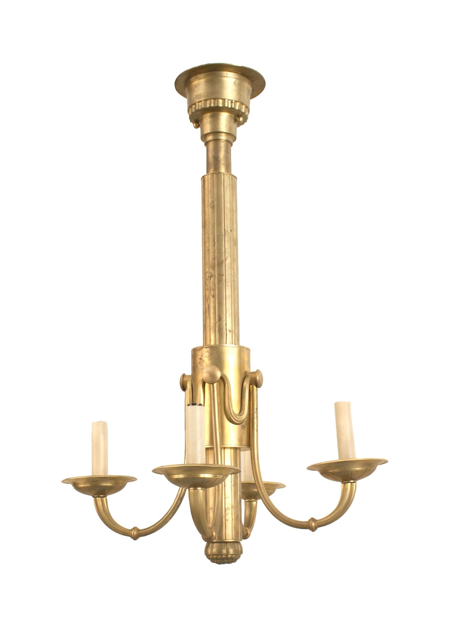 French Mid-Century (1940s) brass chandelier with 4 scroll arms emanating from a fluted center post have swag trim design.
