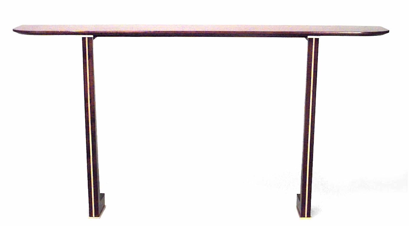 French Mid-Century (1940s) makore veneer console table with rounded rectangular top on a Pair of 