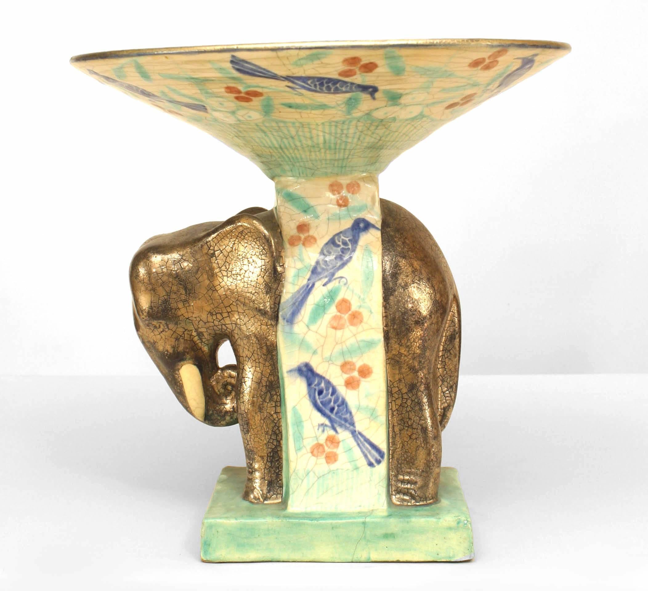 French Mid-Century (1940s) centerpiece with elephant figure supporting bowl with floral and bird decoration (signed: CAZAUX)
