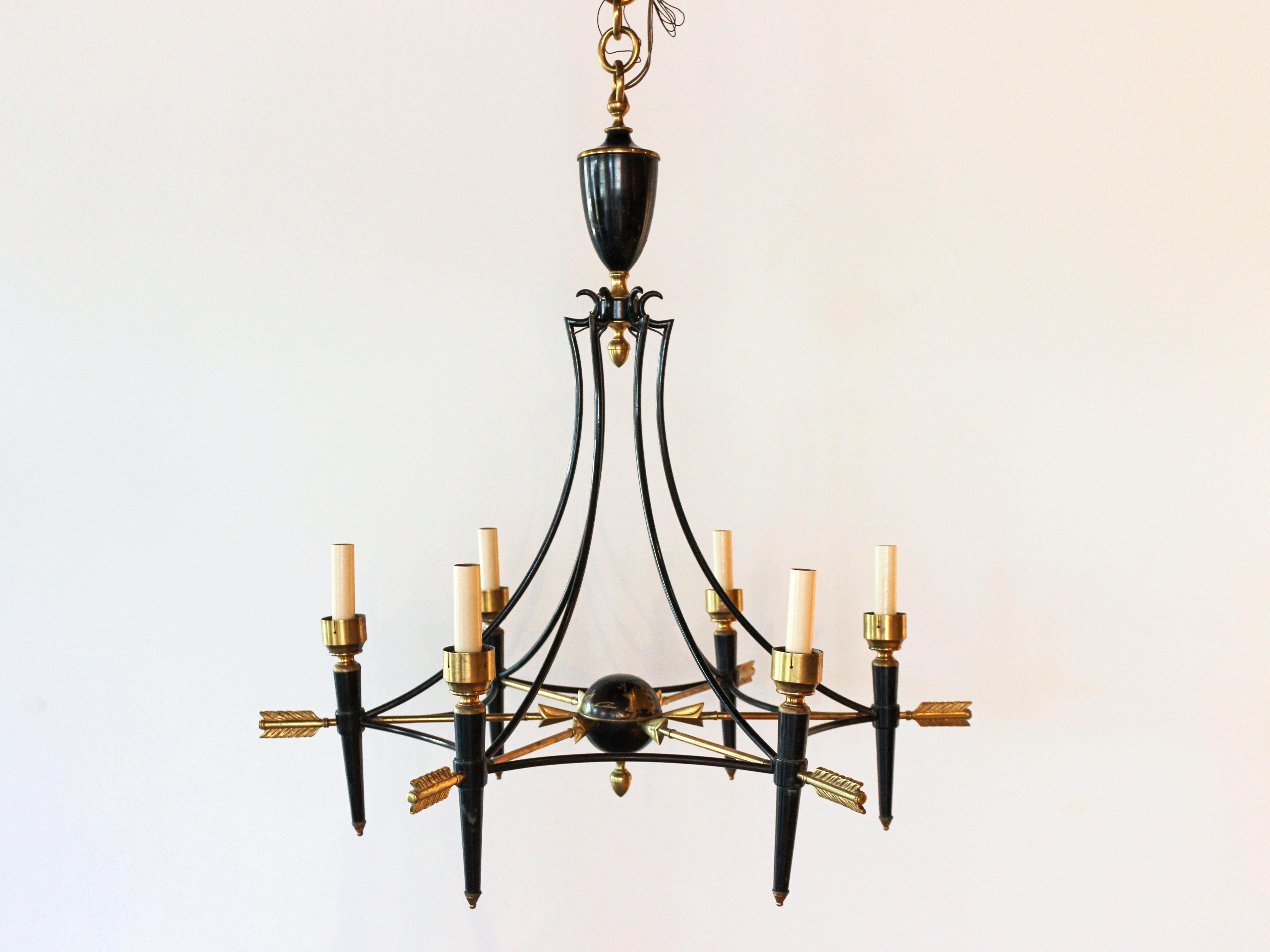 French 1940s Empire Style brass and black lacquered metal chandelier by Maison Jansen. The arrows are in brass with beautiful patina finish. 6 sockets. Newly wired. Chain: 5