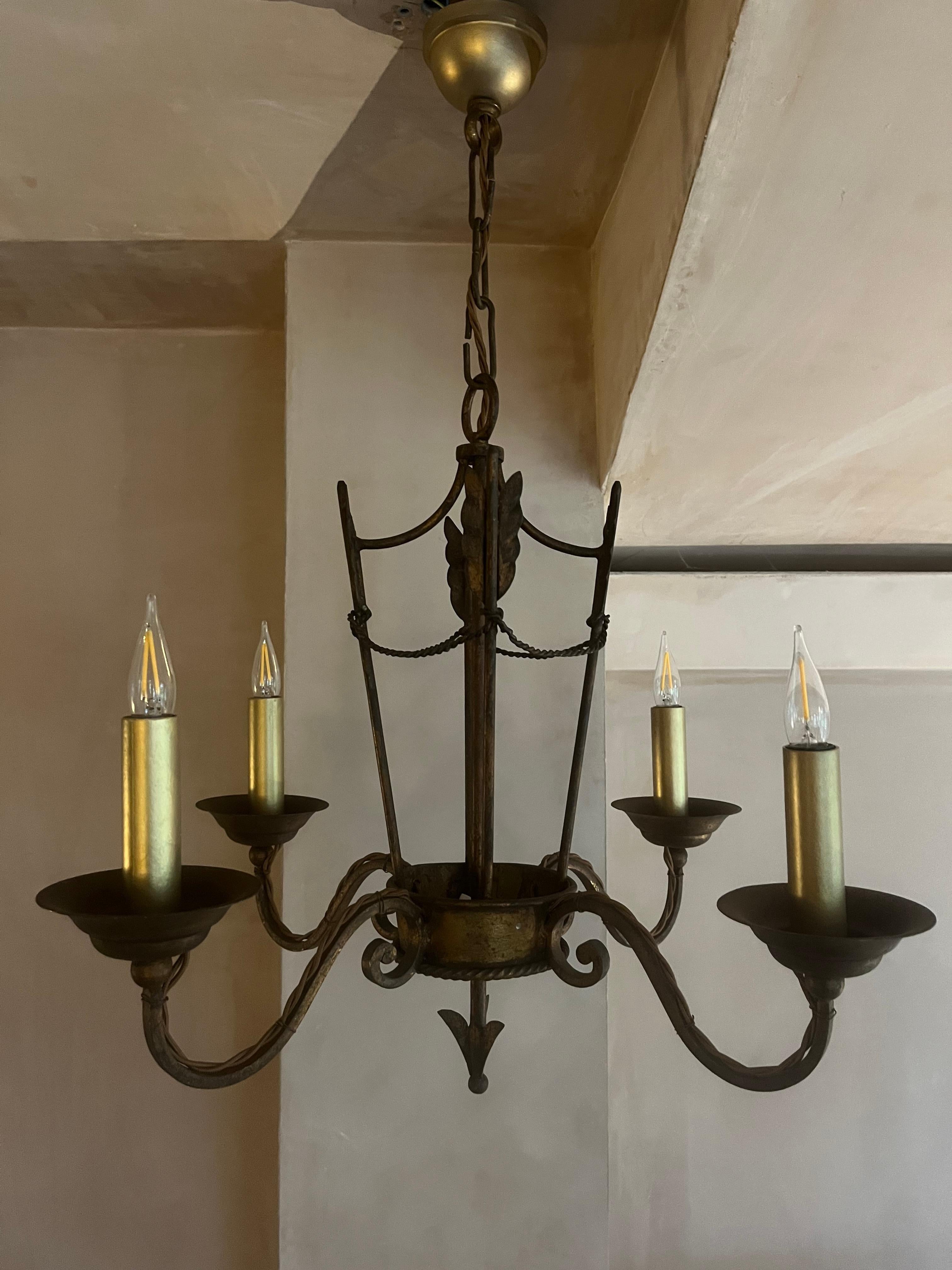 Neoclassical Revival French 1940’s gilded iron chandelier For Sale