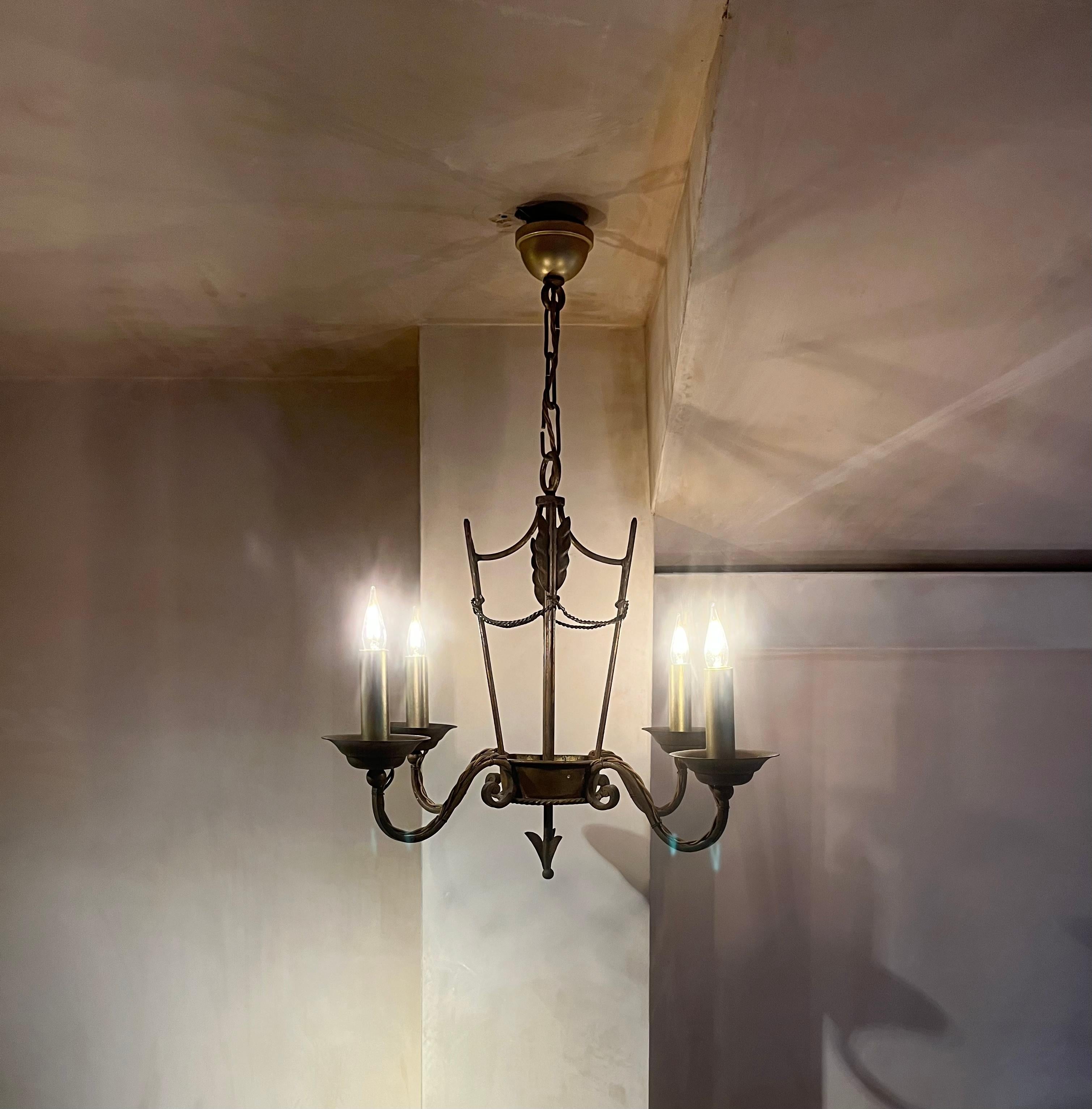 20th Century French 1940’s gilded iron chandelier For Sale