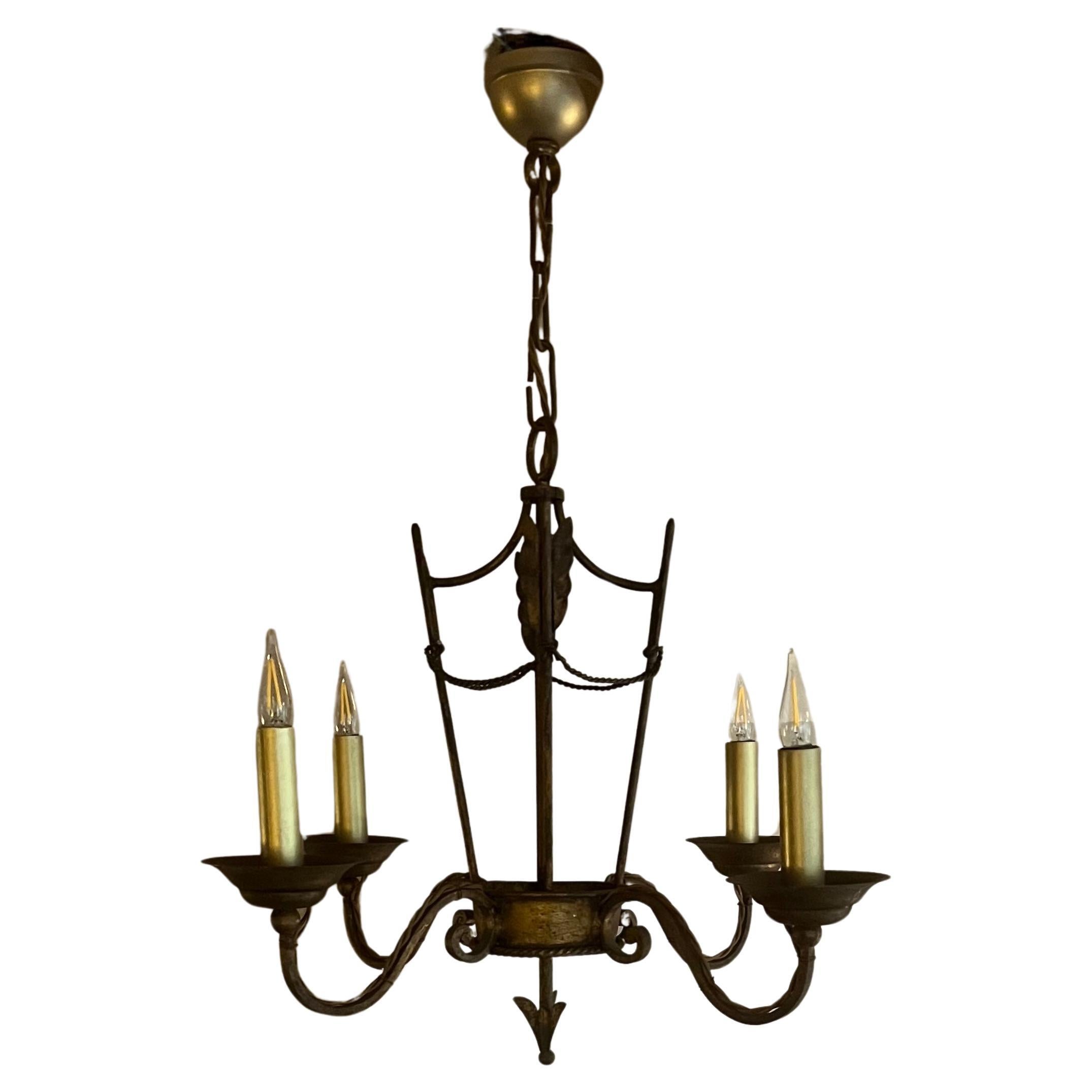 French 1940’s gilded iron chandelier For Sale