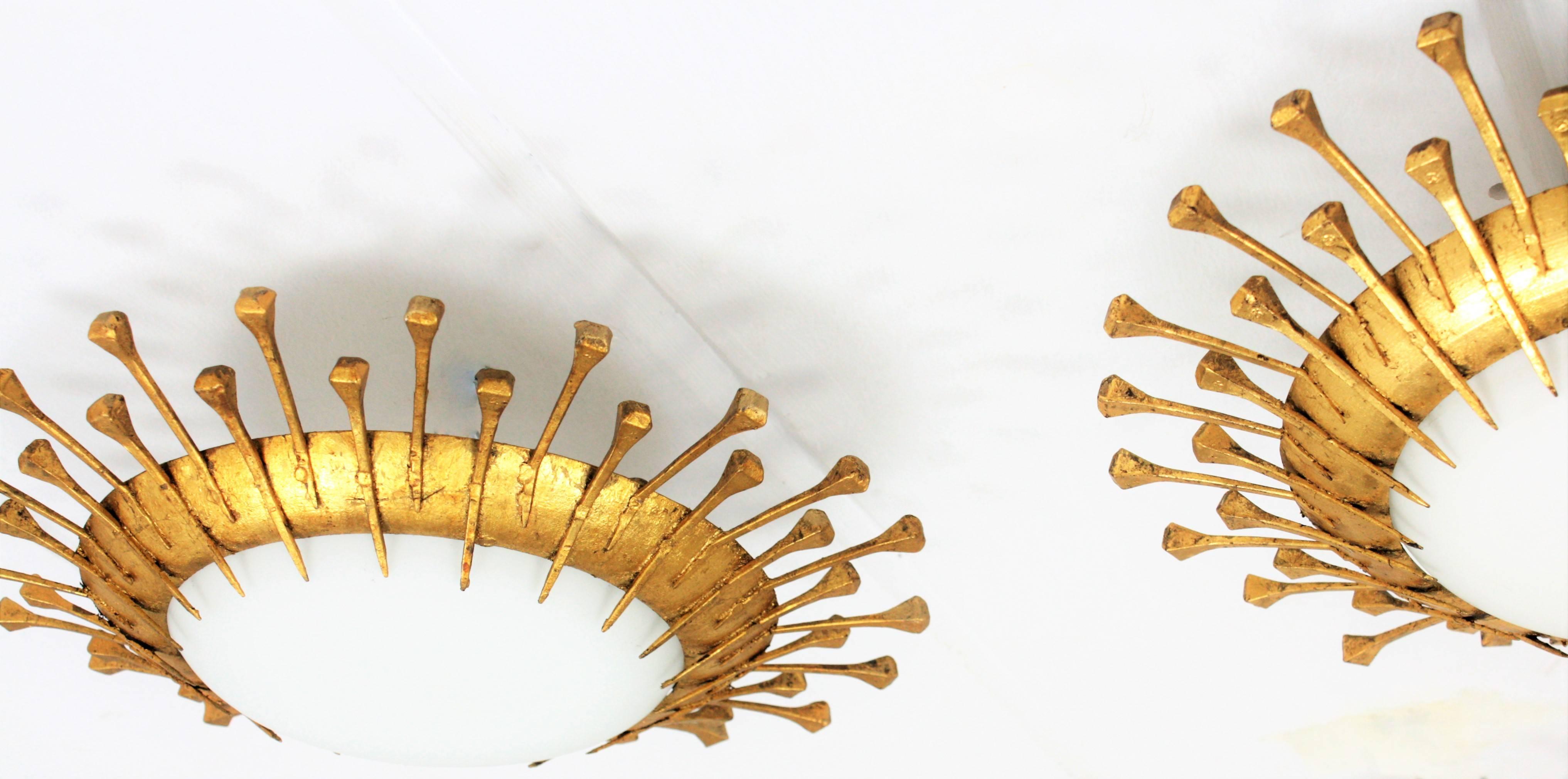 Two French 1940s Gilt Iron Milk Glass Sunburst Light Fixtures with Nails Details 3