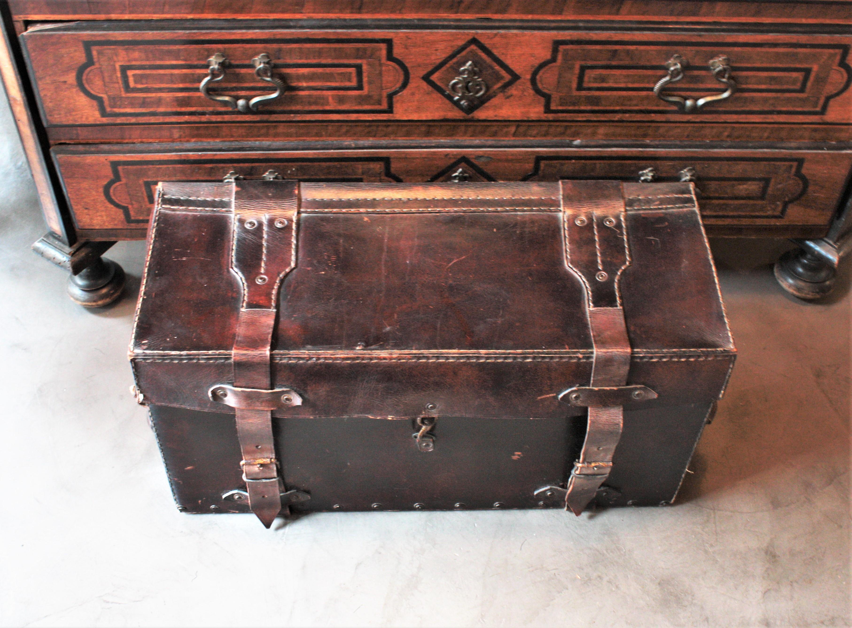 brown leather trunk