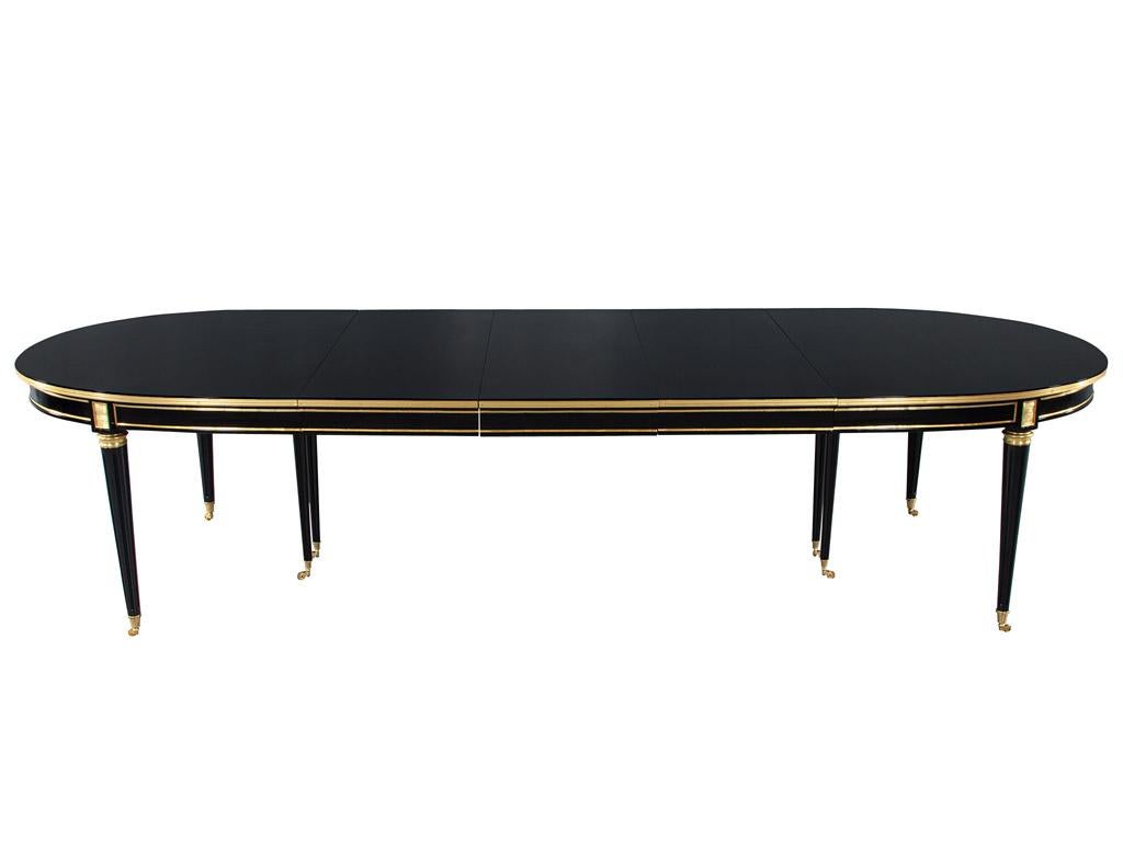 French 1940’s Maison Jansen Dining Table in Polished Black with Brass Detailing In Good Condition For Sale In North York, ON