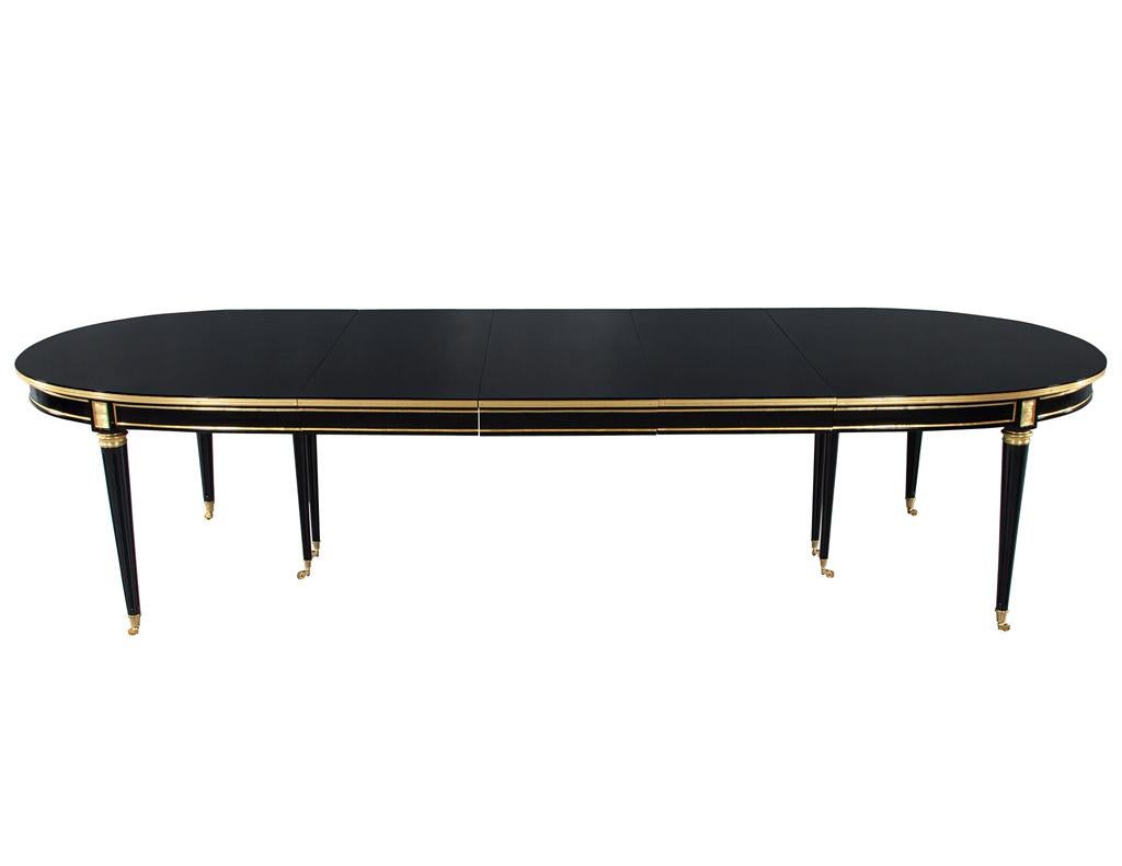 French 1940’s Maison Jansen Dining Table in Polished Black with Brass Detailing In Good Condition In North York, ON