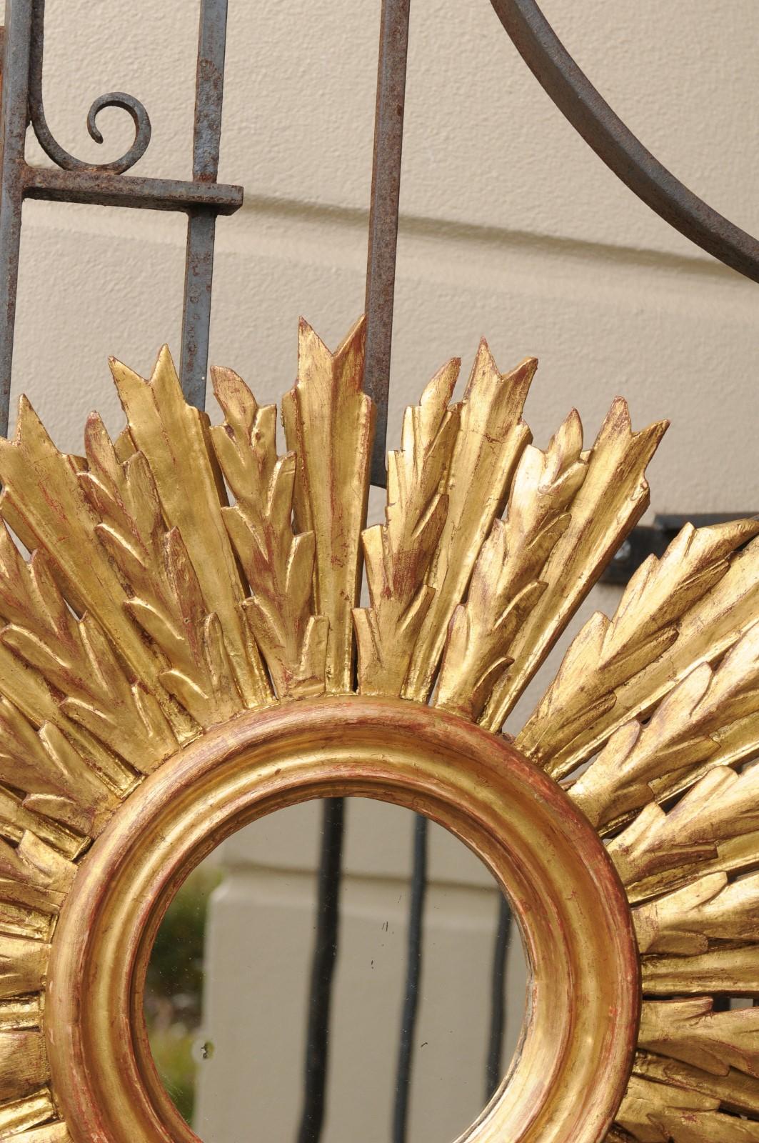 20th Century French 1940s Vintage Carved Giltwood Sunburst Mirror with Radiating Sunrays