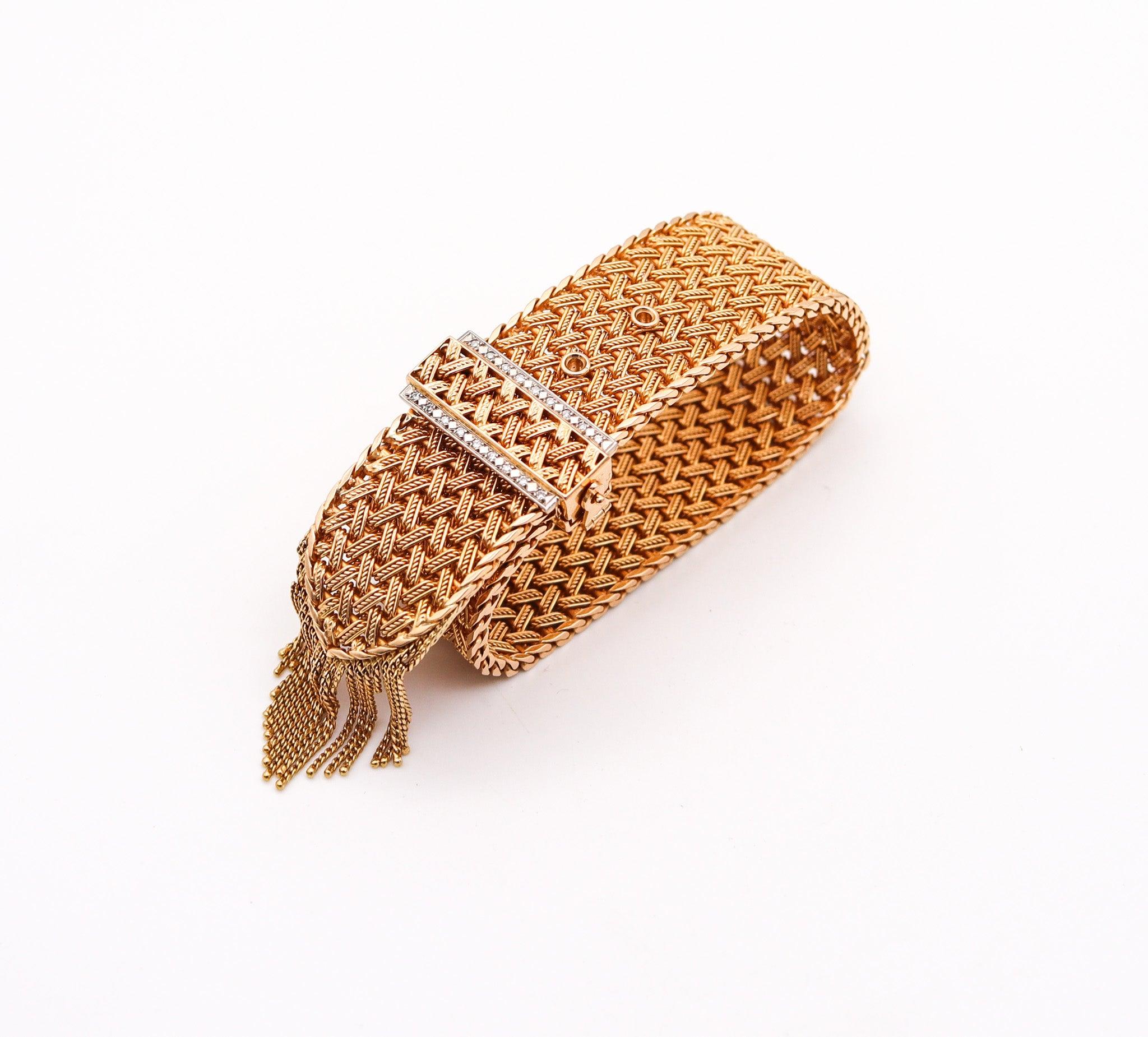 A French buckle mesh bracelet.

An statement buckle bracelet, created in Paris France during the post war period, back in the 1950. The bracelet is very substantial with strong look and has been carefully crafted as a mesh with fringes in solid