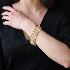 French 1950s 18 Karat Yellow Gold Wire and Twist Openwork Bracelet