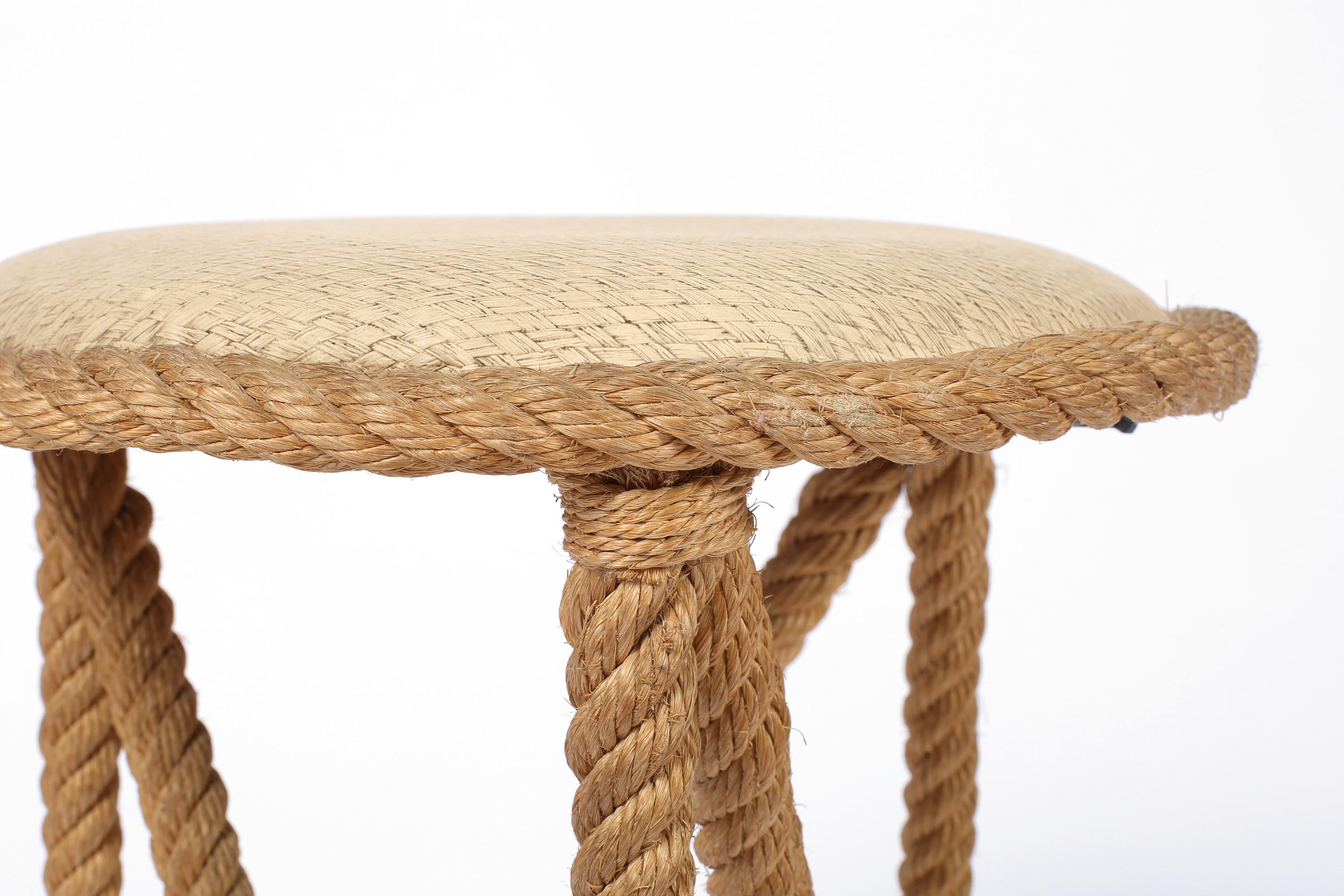 A fun rope clad steel stool by Adrian Audoux & Frida Minnet, with asymmetric zig-zag legs and faux woven upholstered seat pad. French, c. 1950.