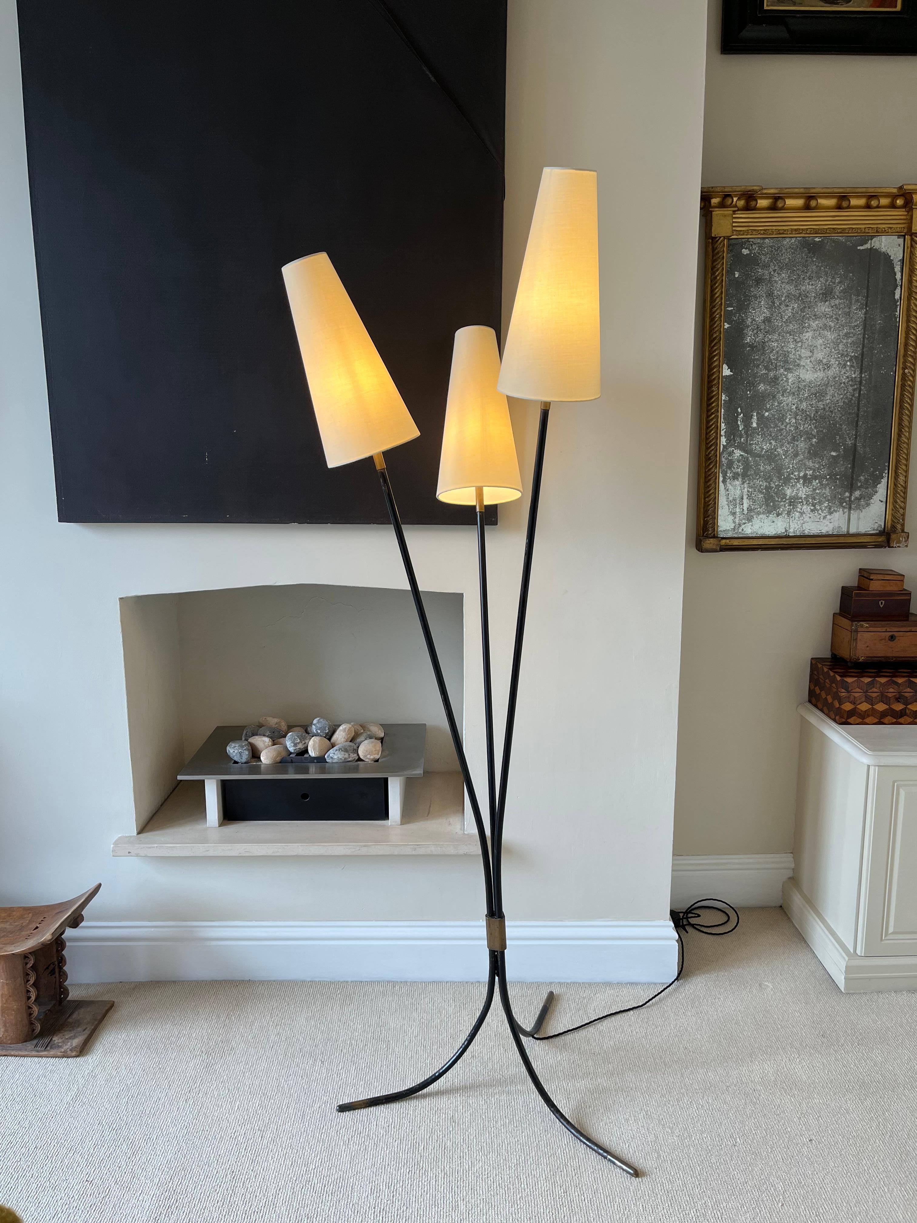 Fabulous quality French three armed floor lamp with bronze metal detail. Shades newly replaced. Lamp rewired with floor switch.
